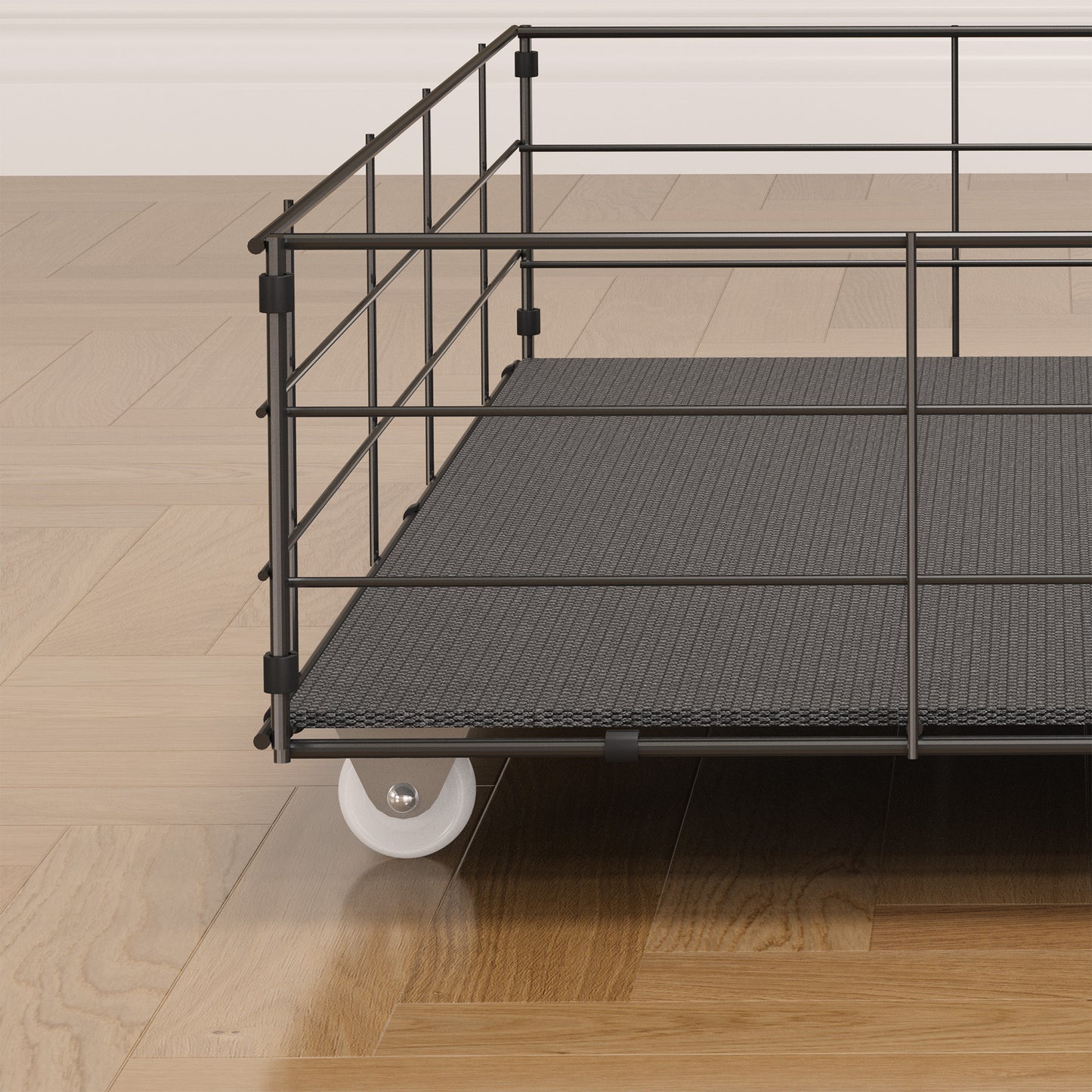 Black metal rolling cart with textured gray platform and white wheel