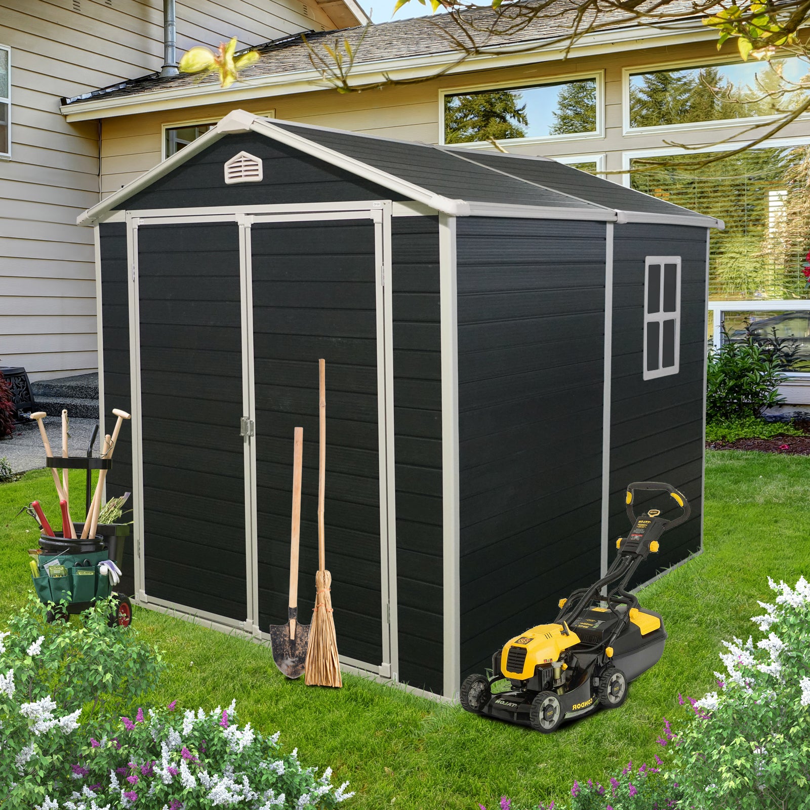 Black resin garden shed with double doors and a window featuring gardening tools and a lawn mower