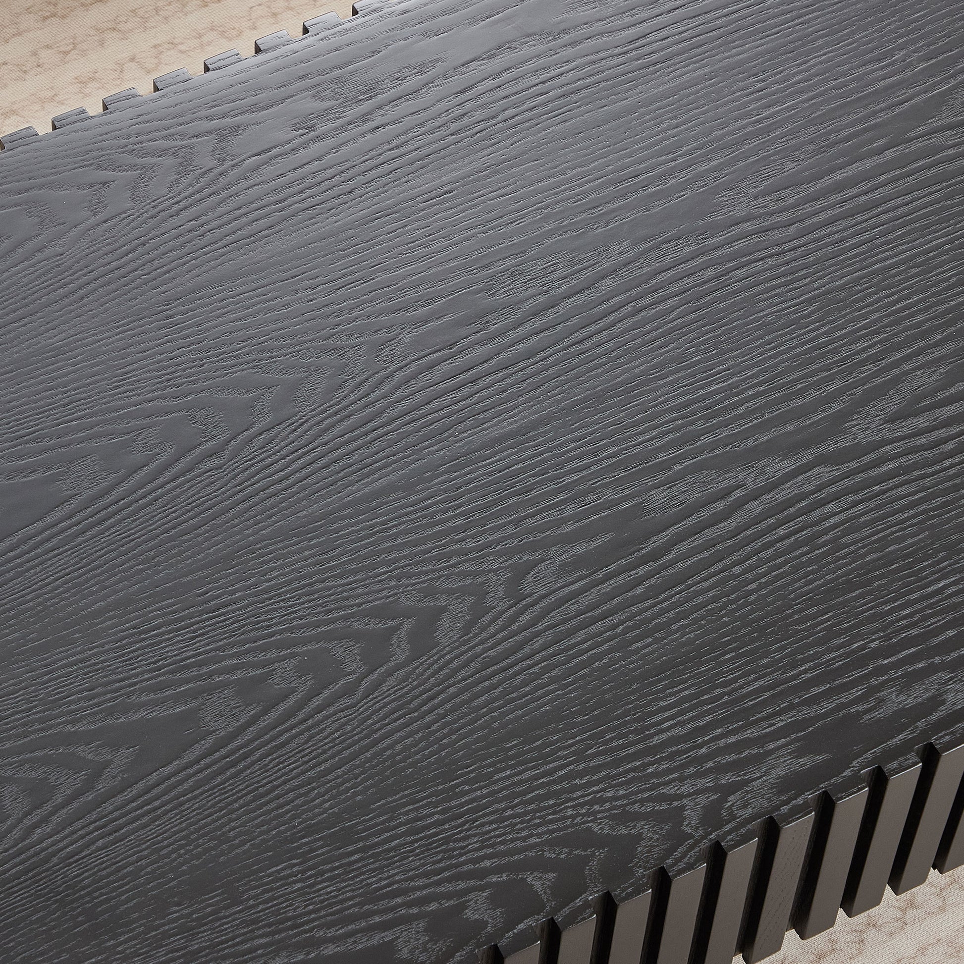 Dark grey oak wood coffee table surface with grooved detailing