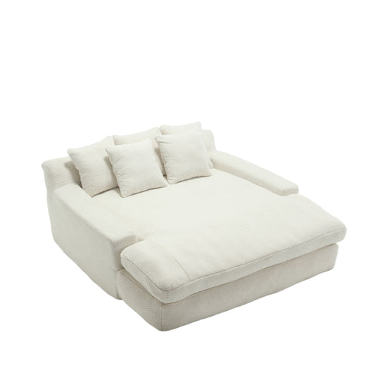 Plush white boucle modular sofa with three accent pillows perfect for modern living rooms