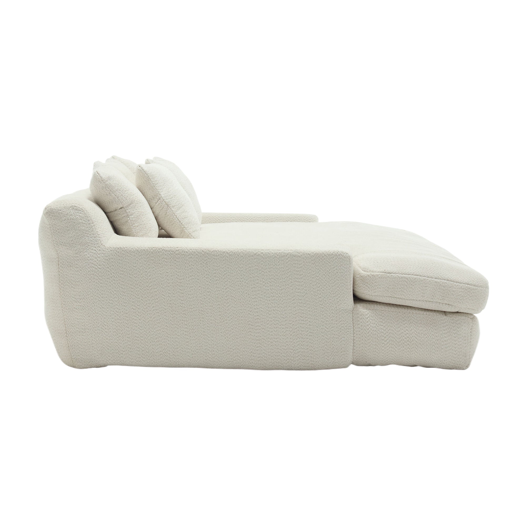 Cream boucle chaise lounge sofa with plush cushions and extended chaise