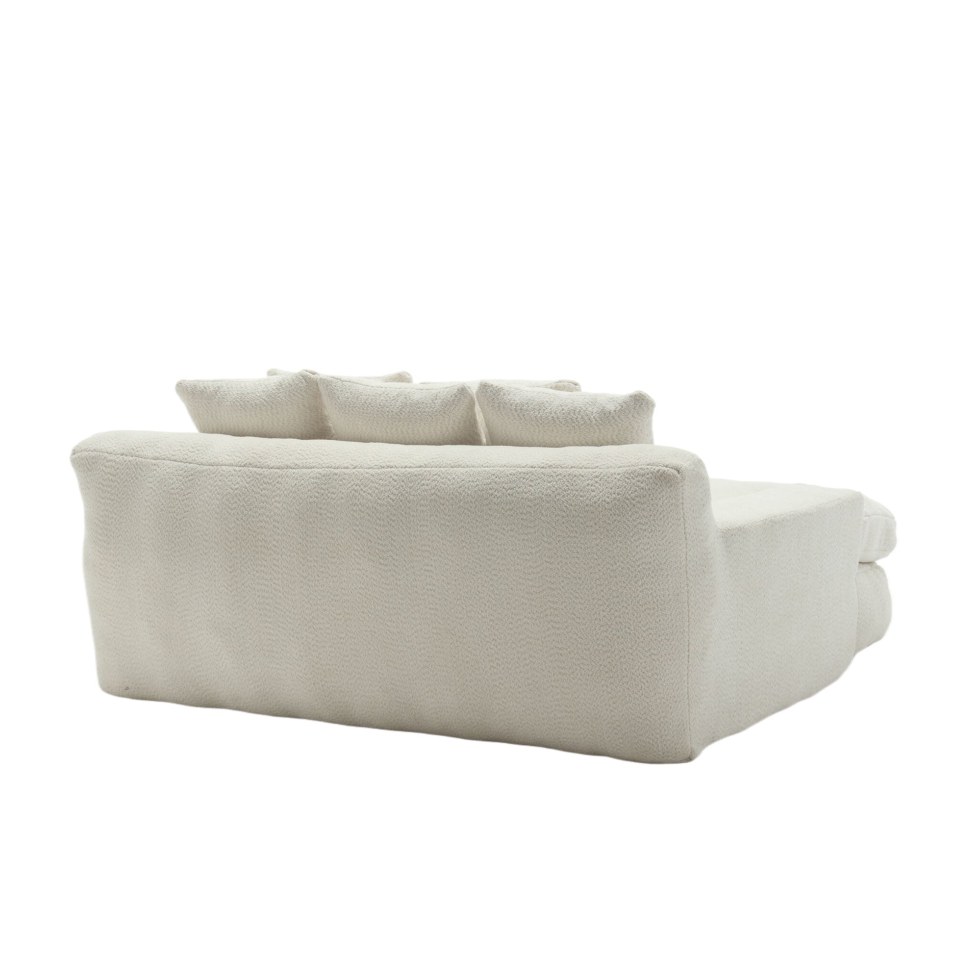 Cream boucle fabric sofa with plush throw pillows modern living room seating