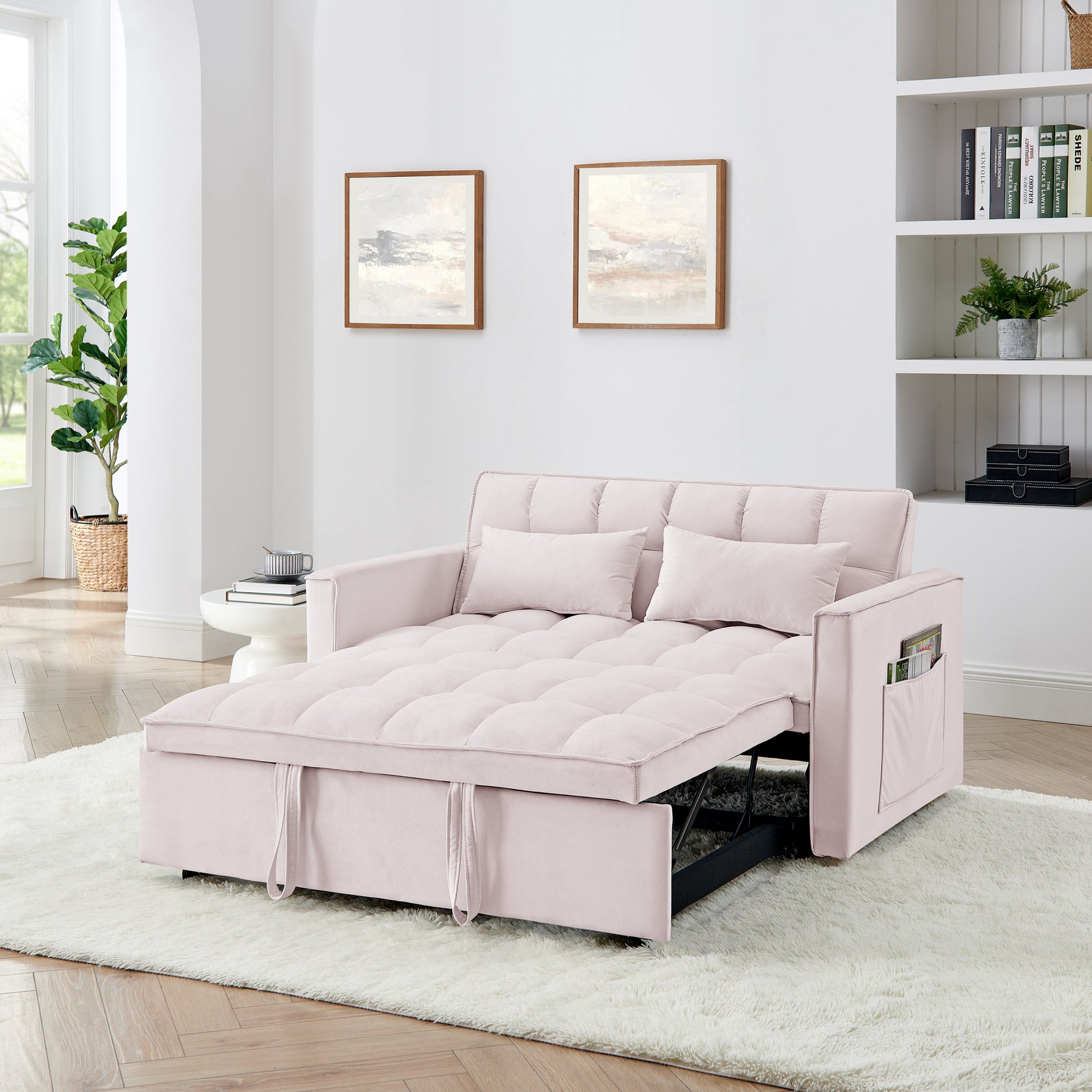 Light pink velvet sofa bed with tufted cushions easily convertible for guest use