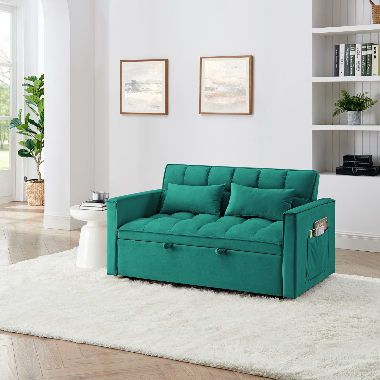 Teal velvet sofa bed with tufted cushions and convenient side pocket for magazines