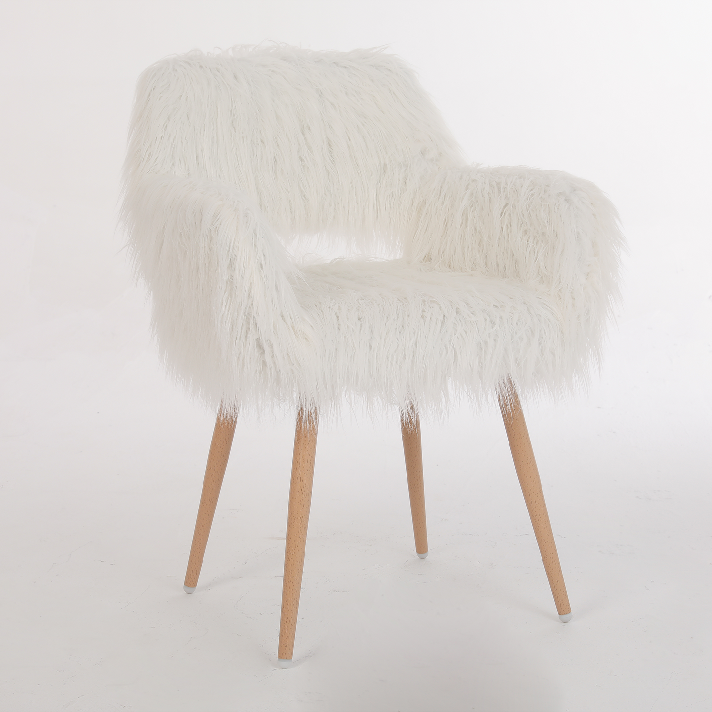 White fluffy accent chair with wooden legs and a cozy design