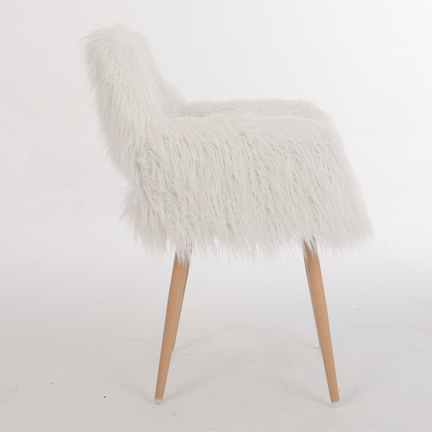 White fluffy accent chair with natural wood legs and midcentury modern design