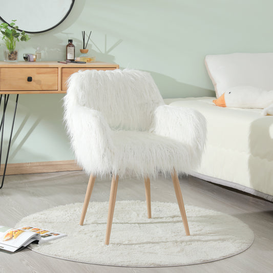 Plush white armchair with wooden legs perfect for a cozy reading nook