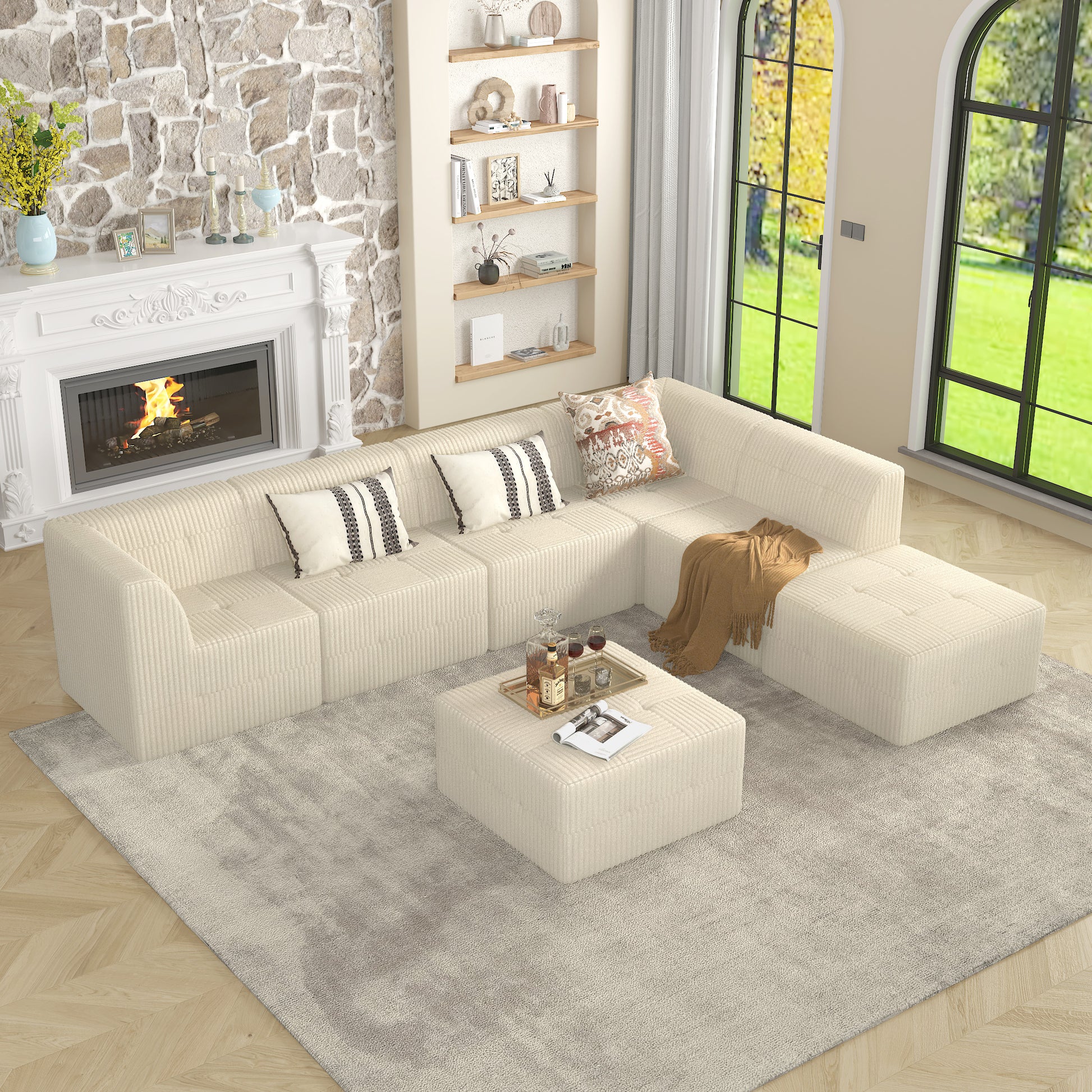 Cream corduroy sectional sofa with tufted seating and plush throw pillows