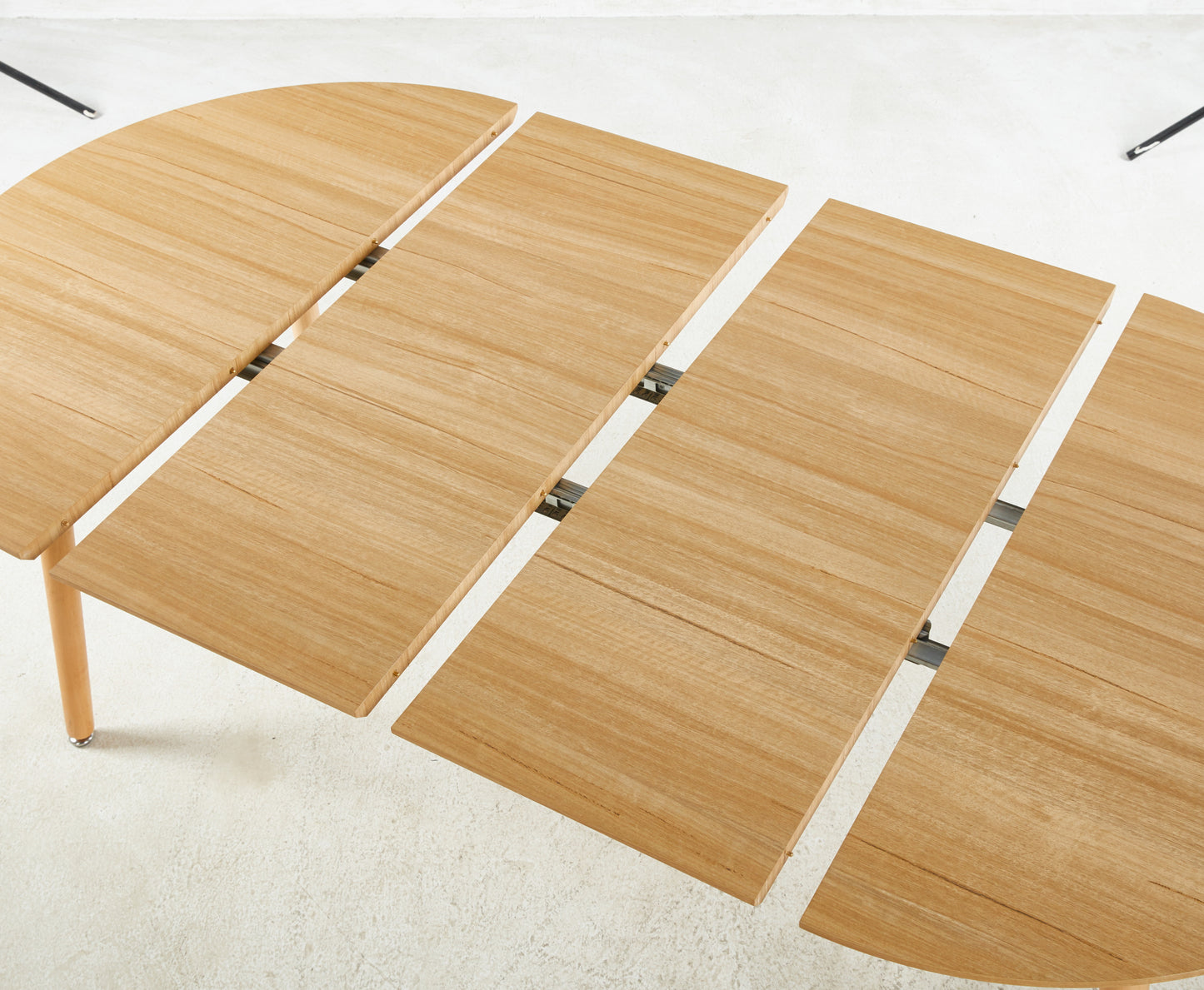 Light oak wood extendable dining table natural wood grain detail modern design for home