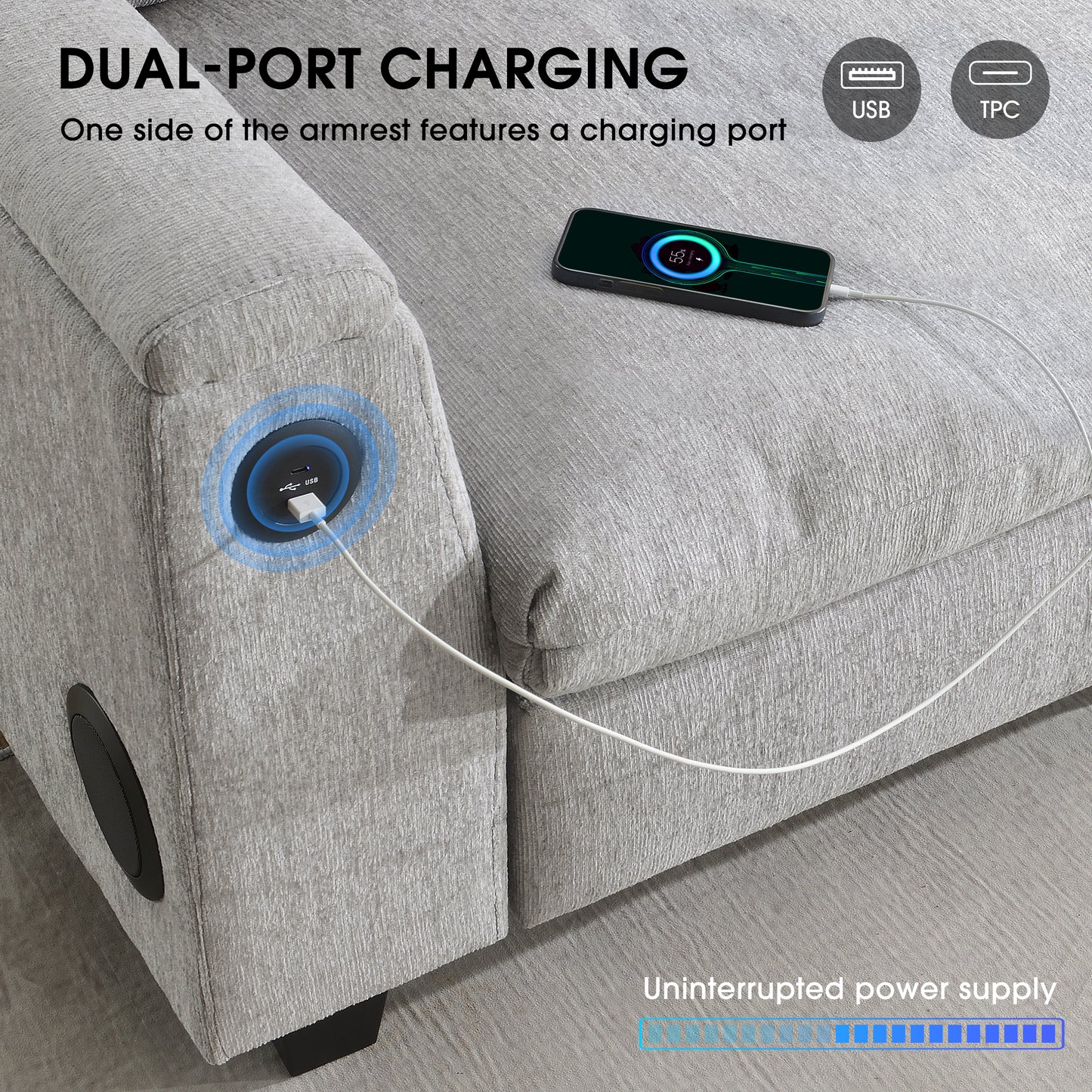 Gray fabric sofa armrest with integrated USB charging port and connected phone