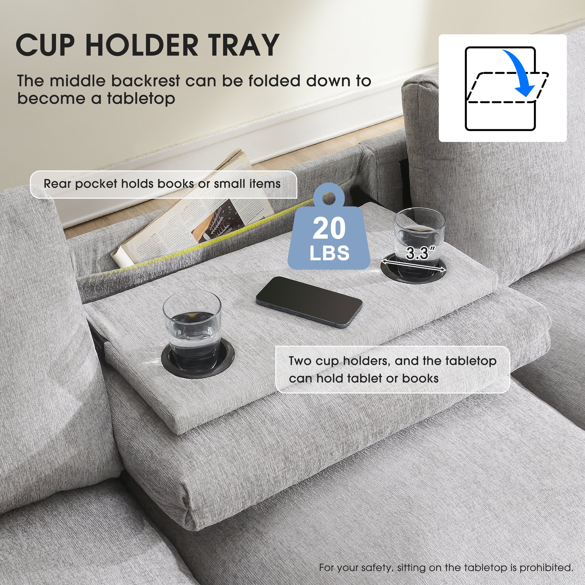 Gray fabric sofa armrest tray with two cup holders and a flat surface