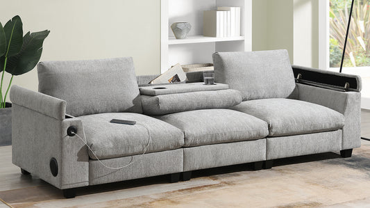 Grey fabric sectional sofa with builtin USB charging ports and speakers