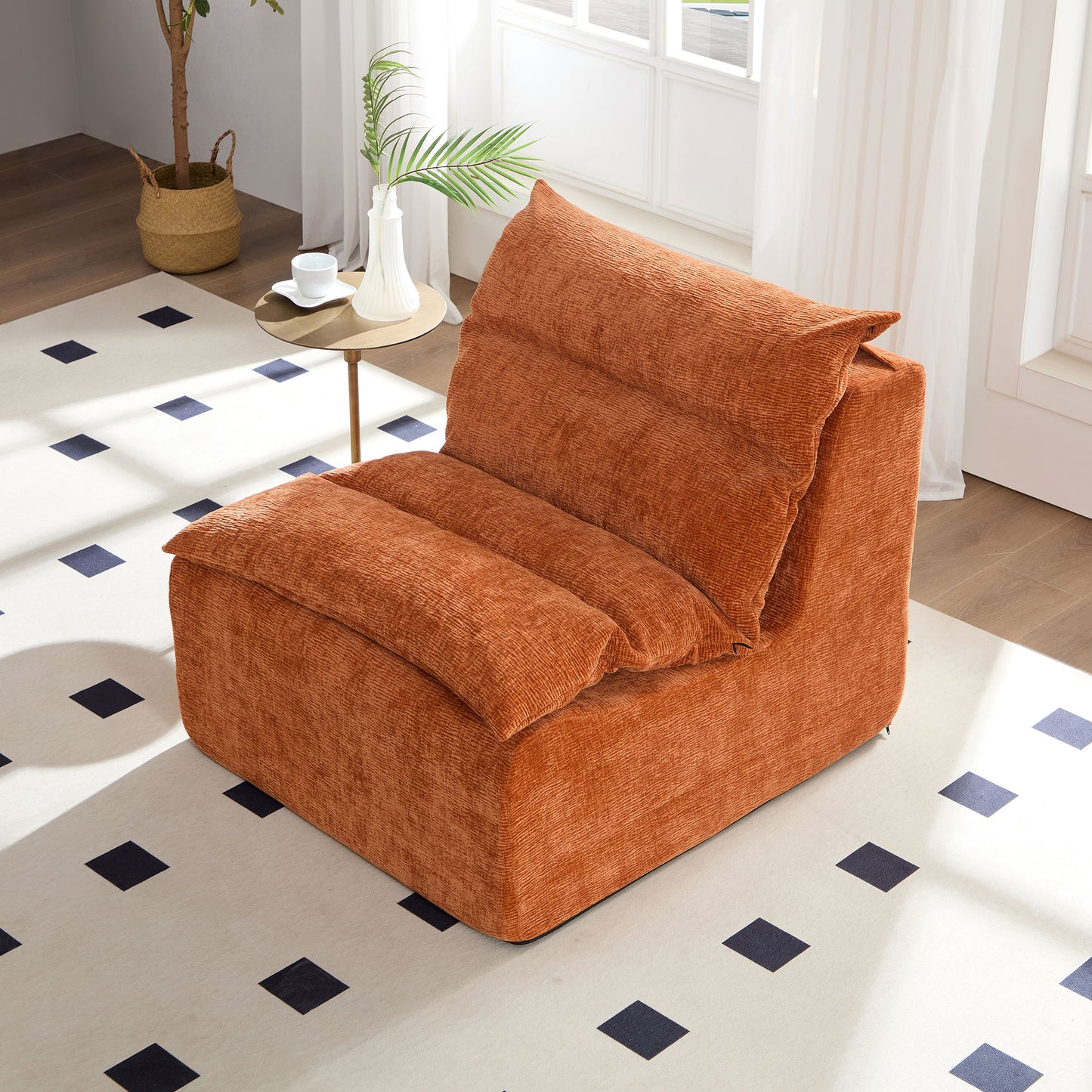 Orange textured accent chair with plush cushioning and a modern design