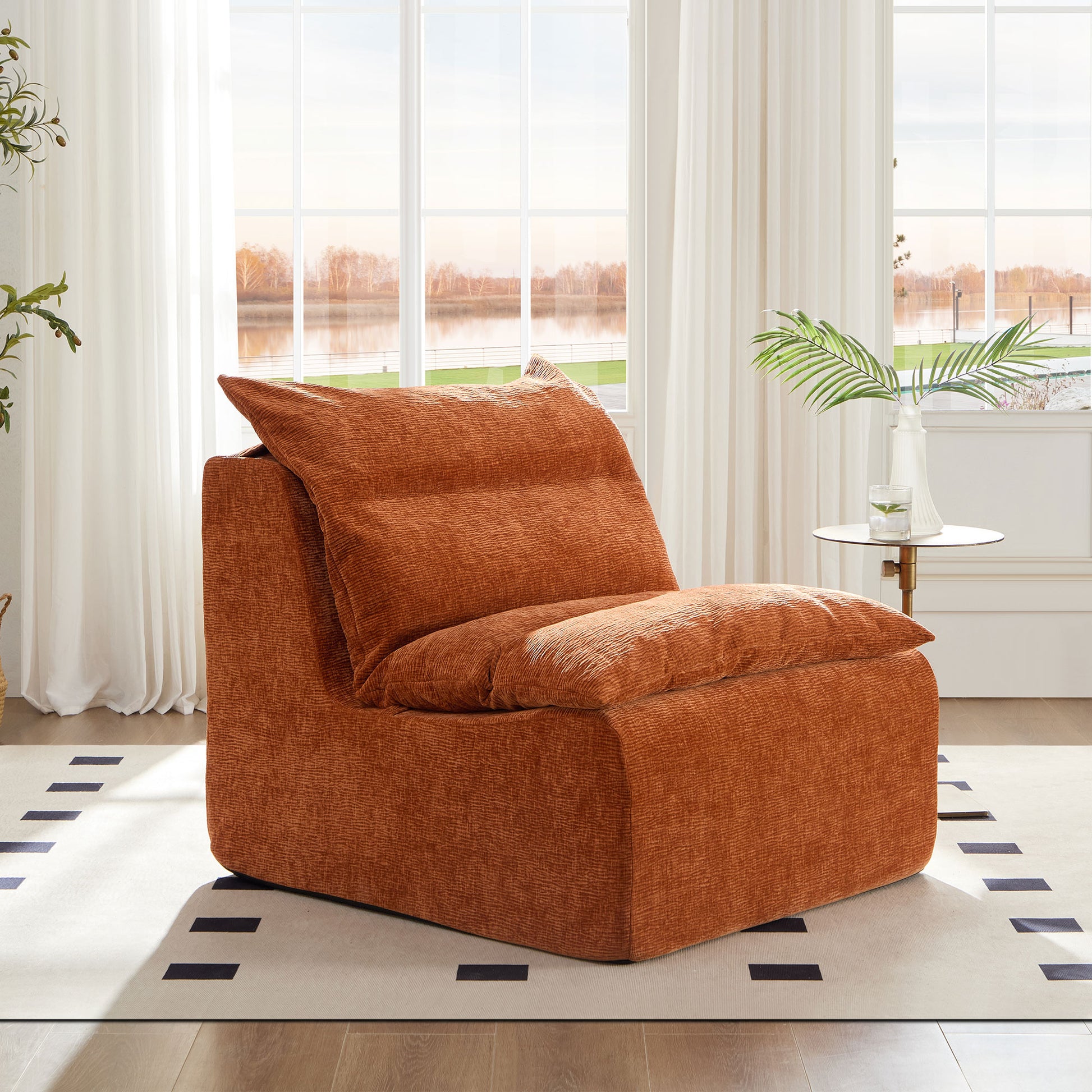 Orange textured armchair with plush cushions ideal for a cozy living room relaxation