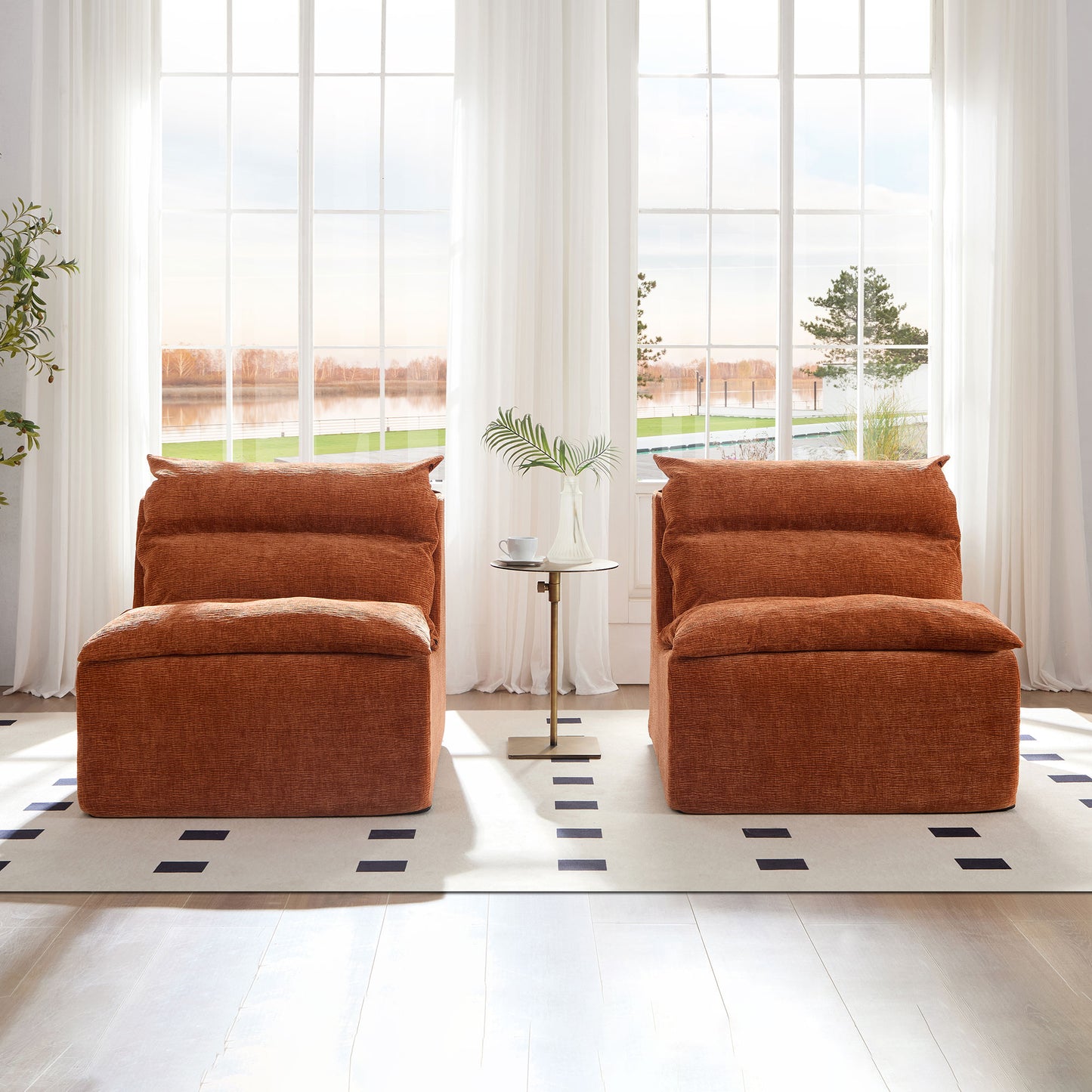 Plush terracotta armless accent chair with textured fabric upholstery and a contemporary design