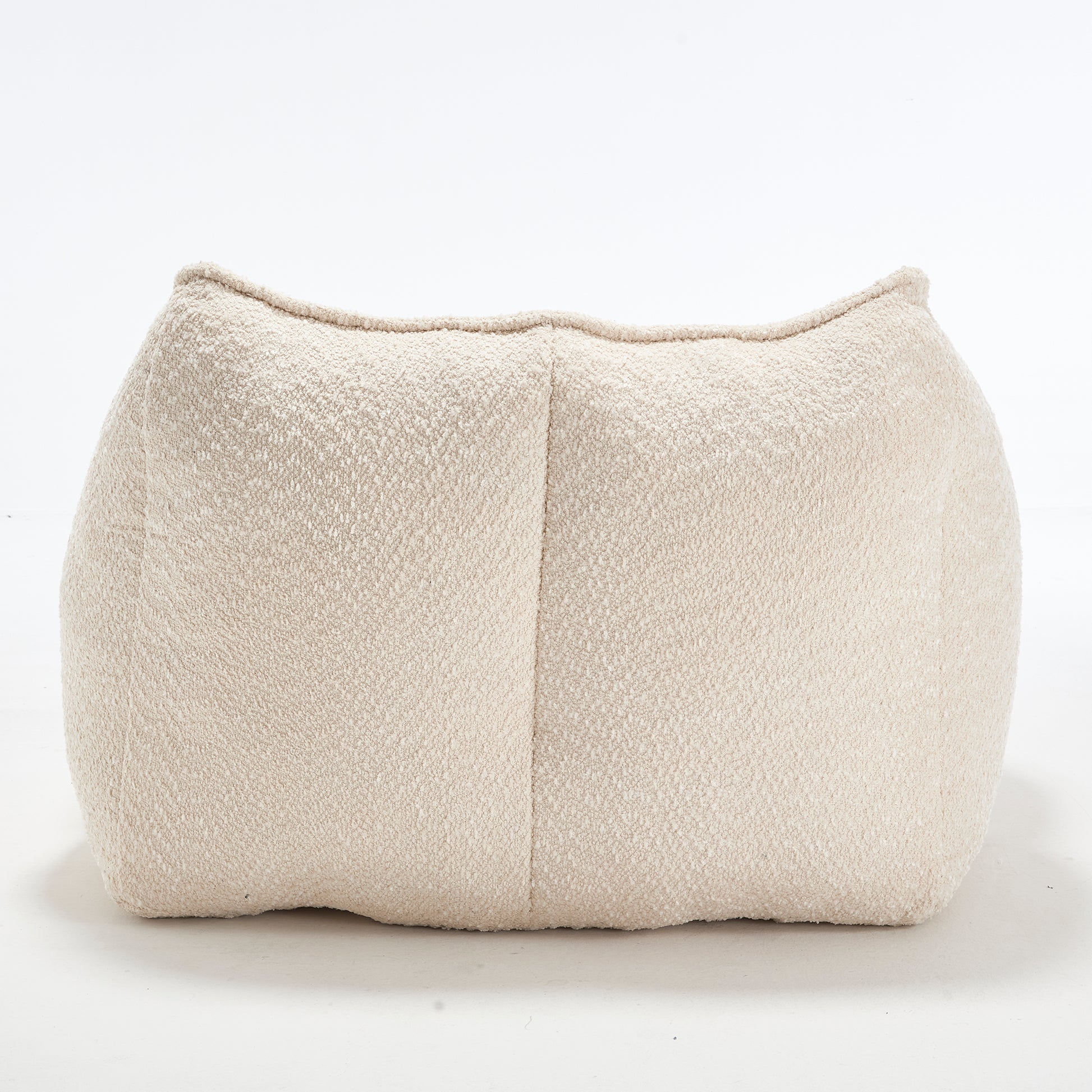Cream boucle fabric ottoman with curved top and textured surface