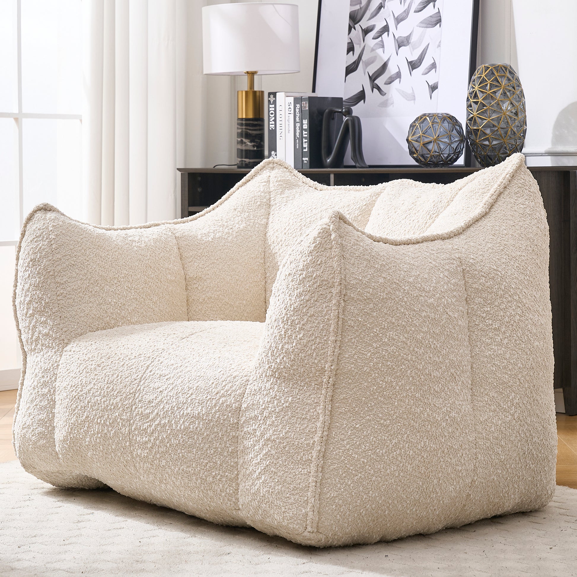 Cream boucle accent chair with a plush inviting texture for modern living rooms