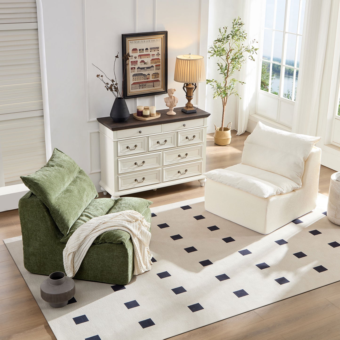 Plush green armchair with textured fabric and an ivory knit throw perfect for cozy living rooms