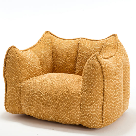 Round textured boucle accent chair in warm mustard yellow perfect for modern living spaces