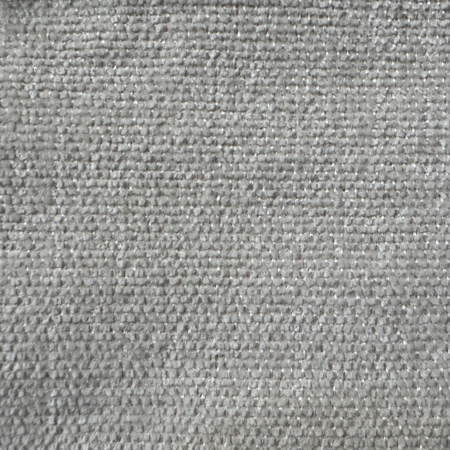 Closeup of a textured silver chenille fabric ideal for upholstery and soft furnishings