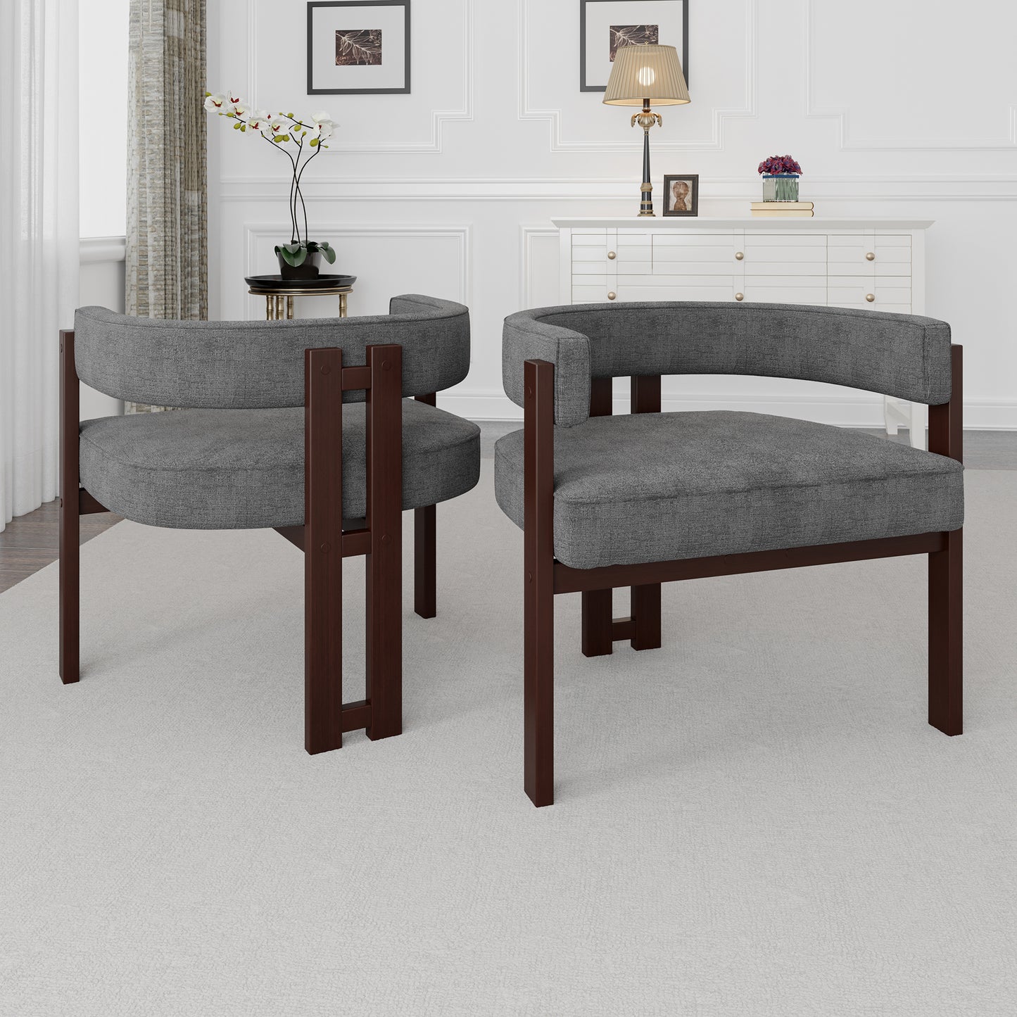 Pair of grey upholstered accent chairs with dark wood frames