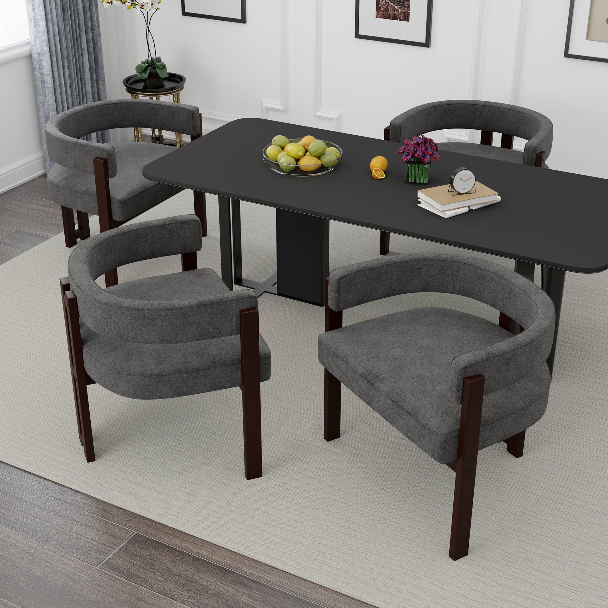 Modern grey upholstered dining chair with curved back and dark wood frame
