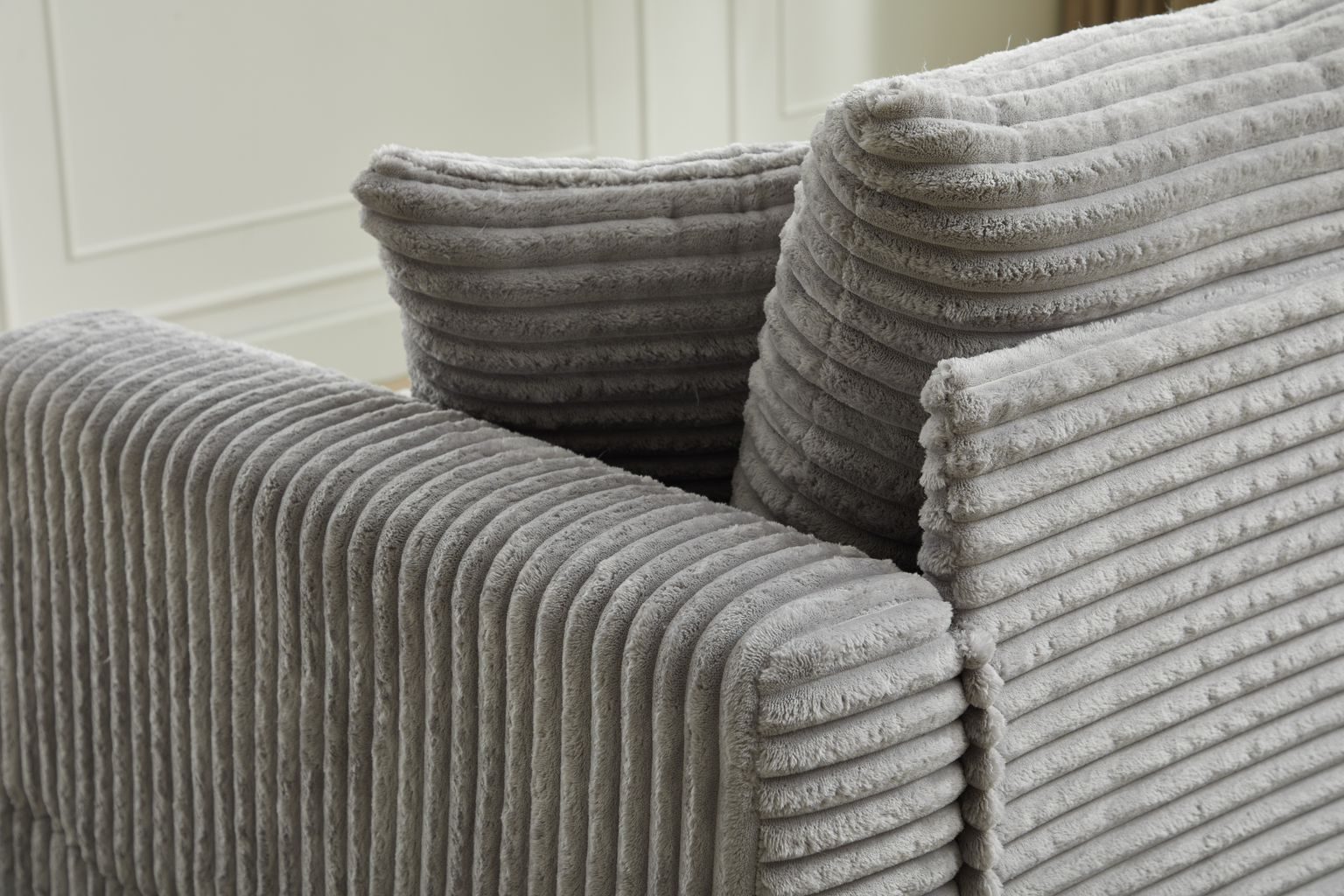 Grey corduroy couch cushions with plush texture