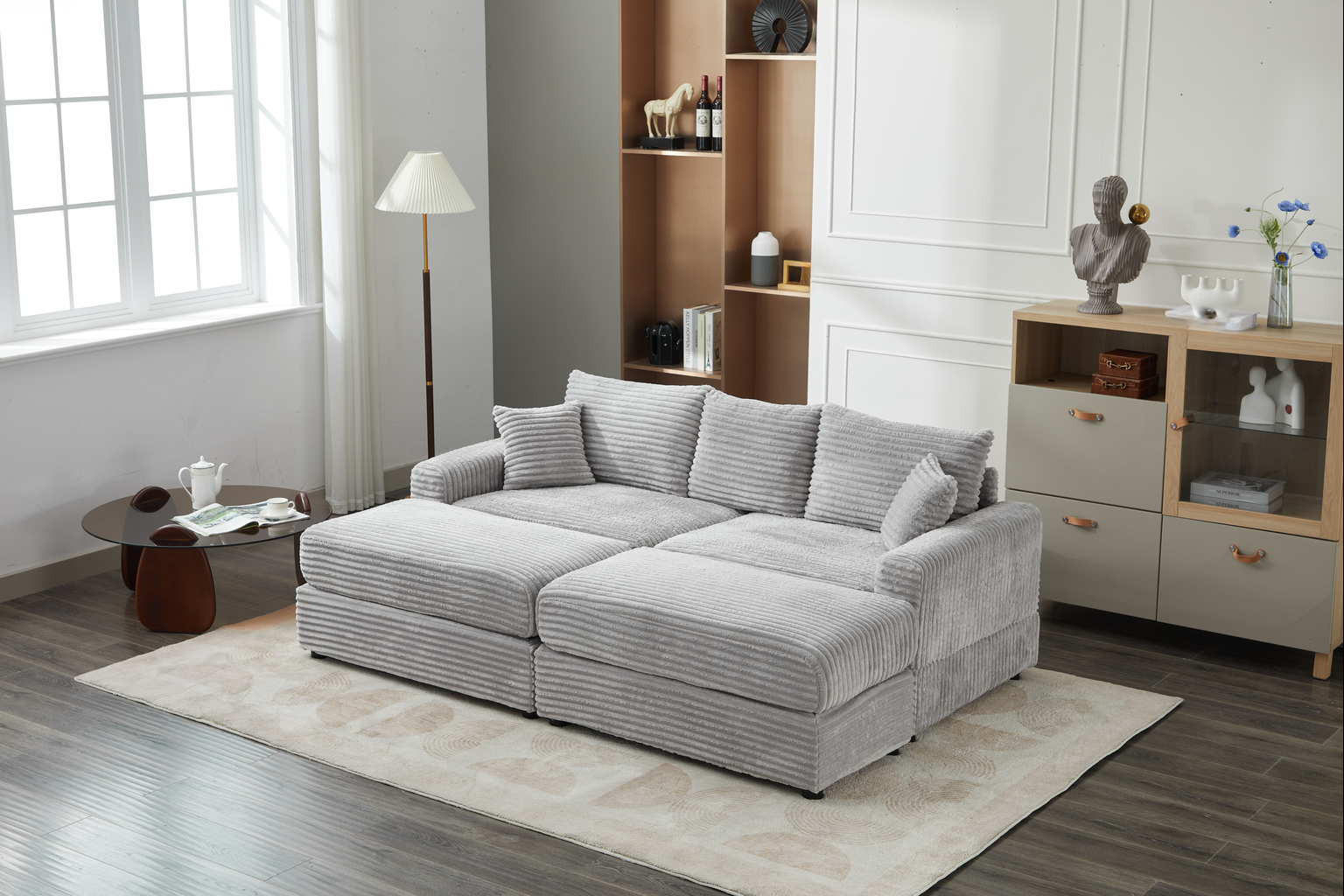 Plush grey corduroy sectional sofa with reversible chaise for a cozy living room setup