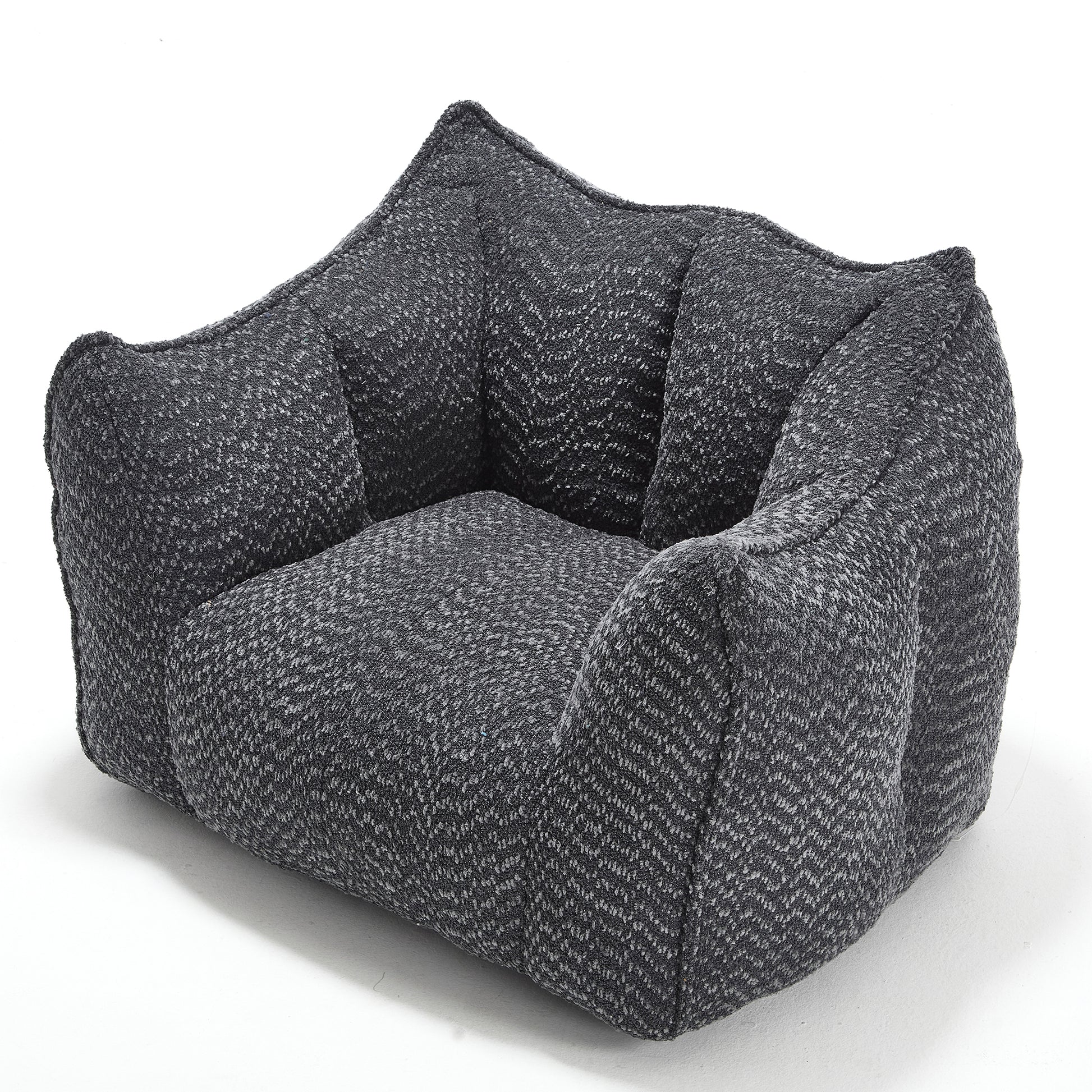 Dark gray textured dog bed with cushioned sides and a low profile