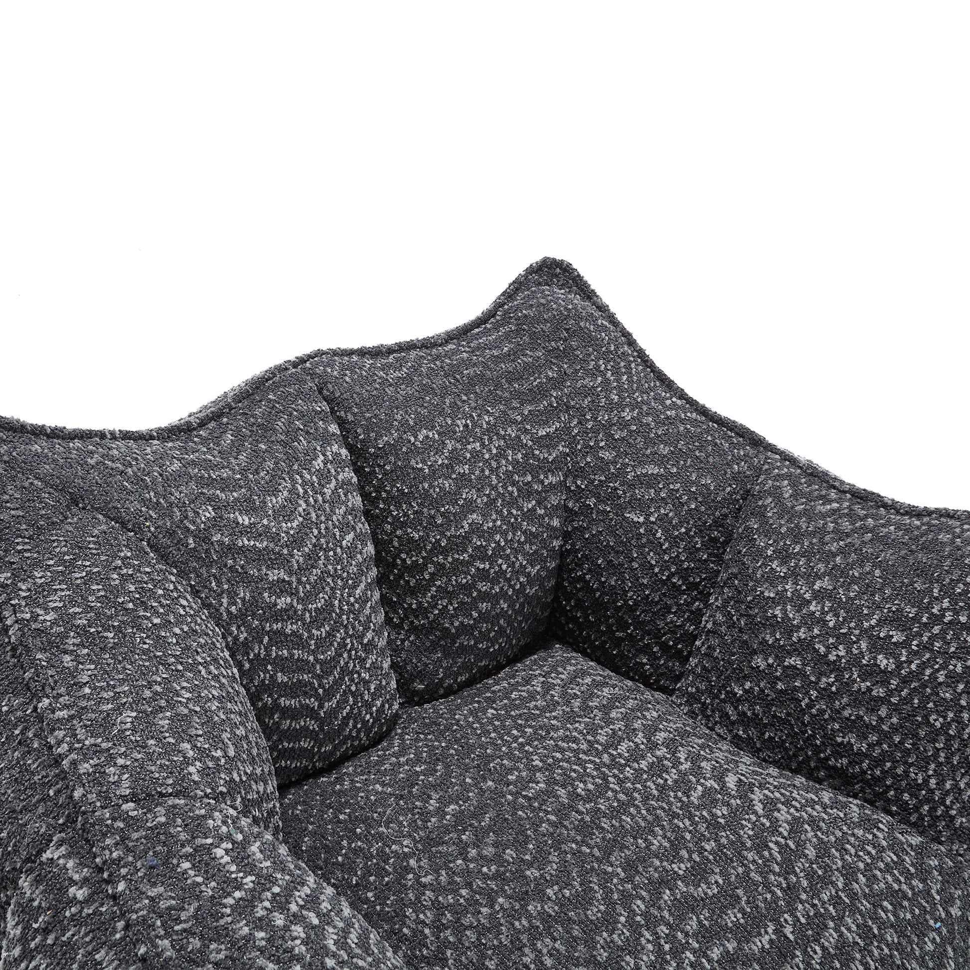Textured dark gray plush pet bed with bolstered sides for comfort