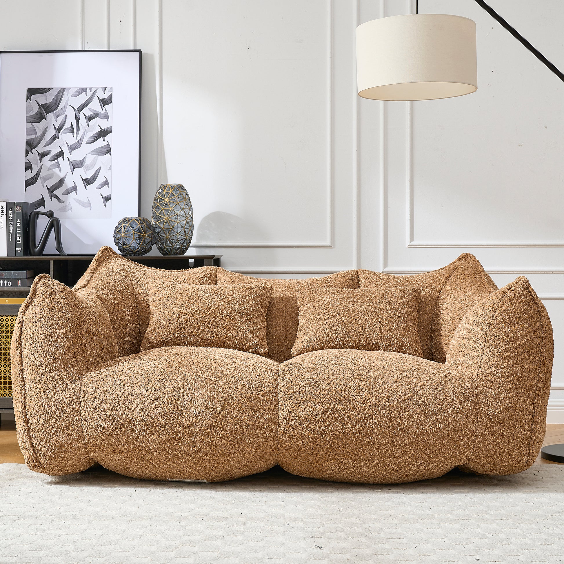 Cozy teddy fabric sofa in warm brown featuring plush cushions and a modern inviting design