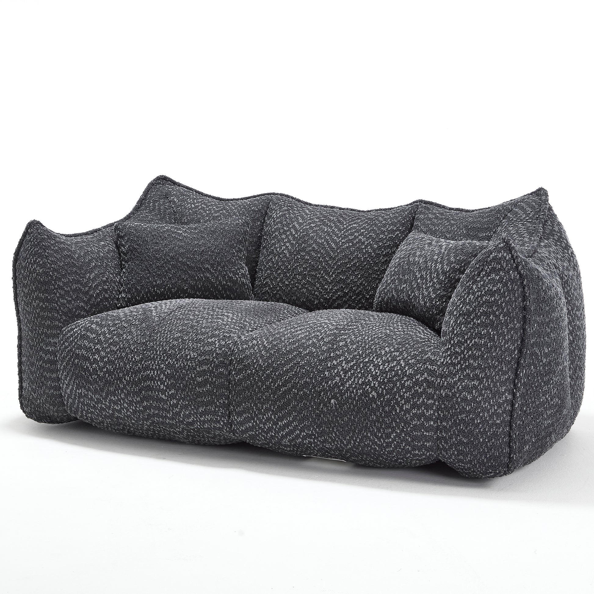 Dark gray textured sofa with herringbone pattern fabric and plush cushions modern living room furniture