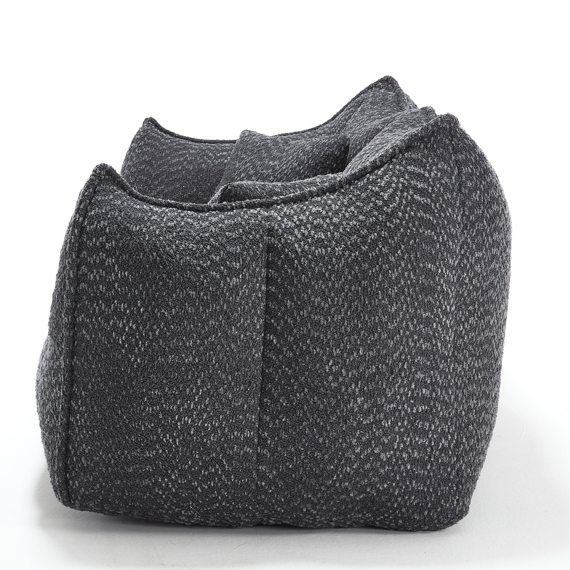 Dark grey textured fabric ottoman with rounded corners