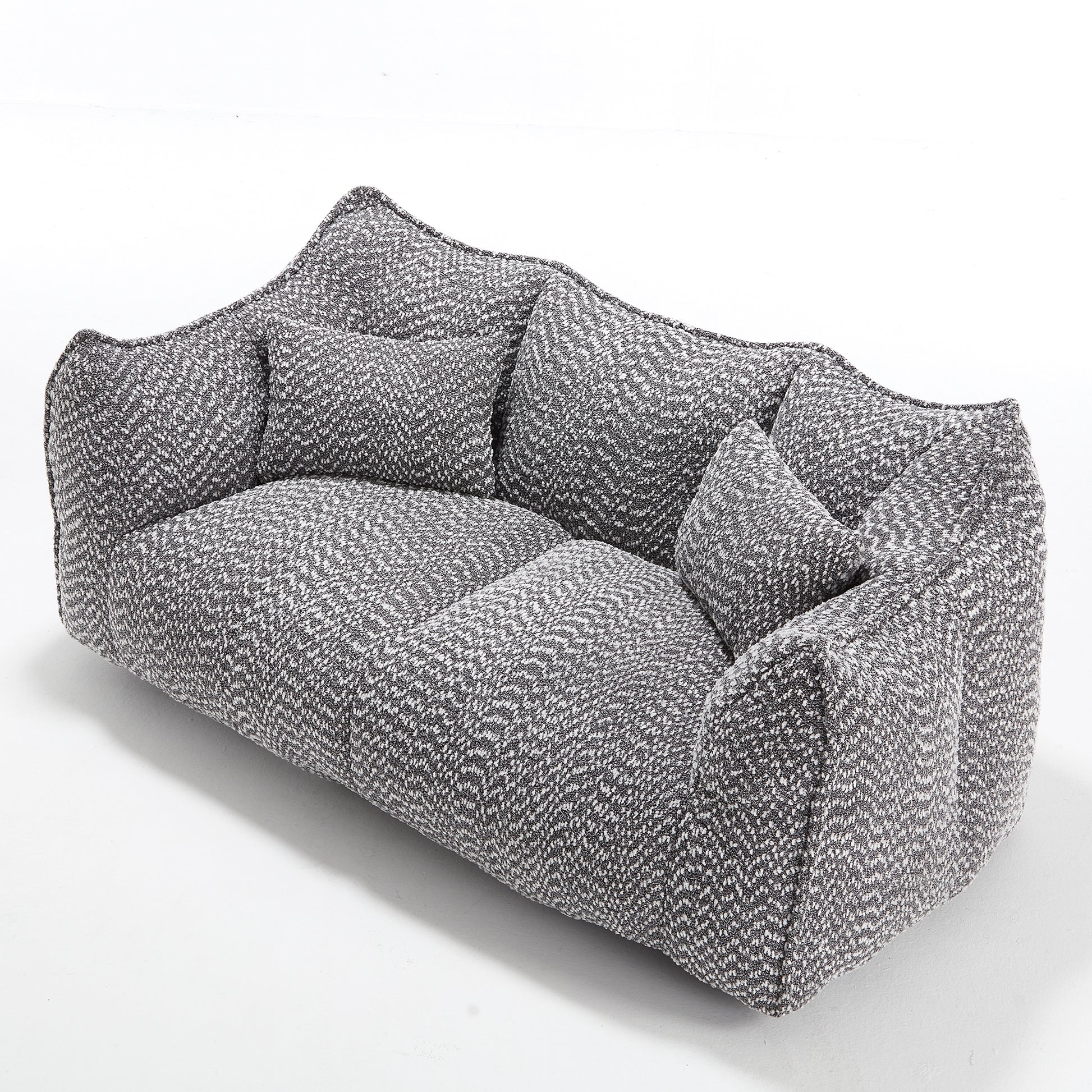 Plush gray and white textured modern sofa with deep cushions perfect for living rooms