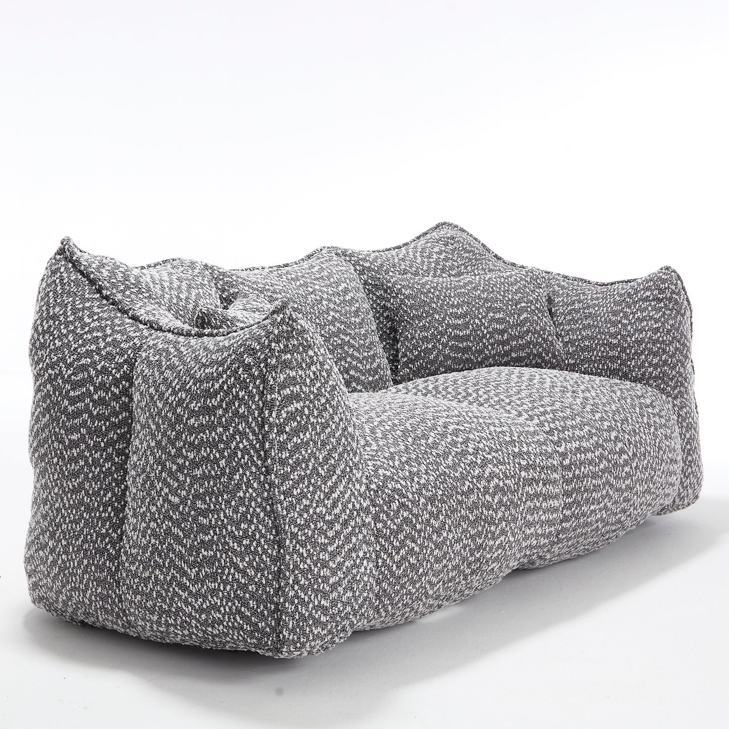 Textured grey and white boucle fabric twoseater sofa with plush cushions