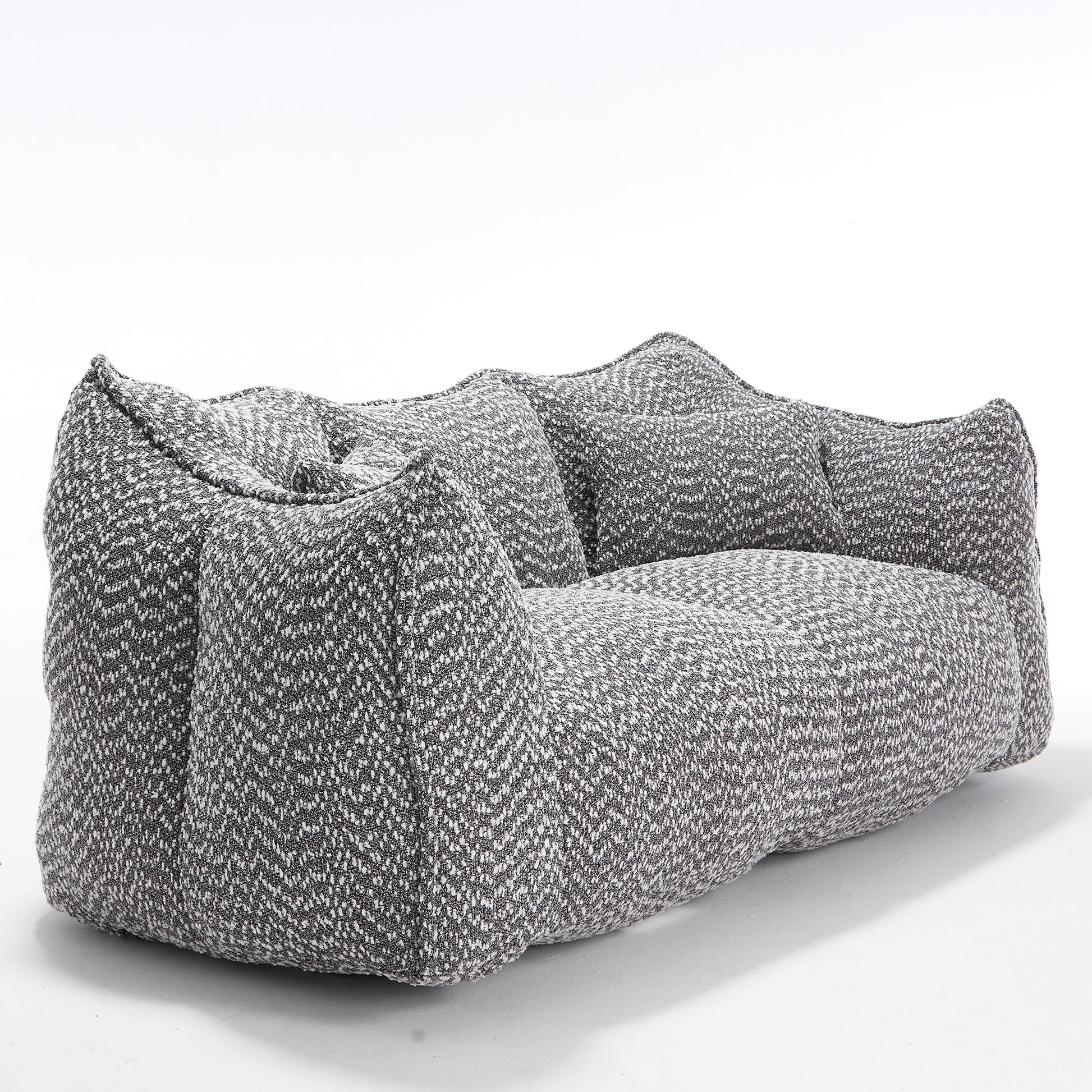 Textured grey and white boucle fabric twoseater sofa with plush cushions