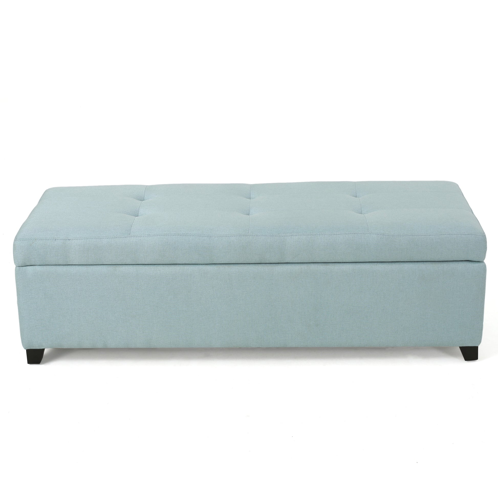 Tufted light blue fabric storage ottoman with dark wood legs