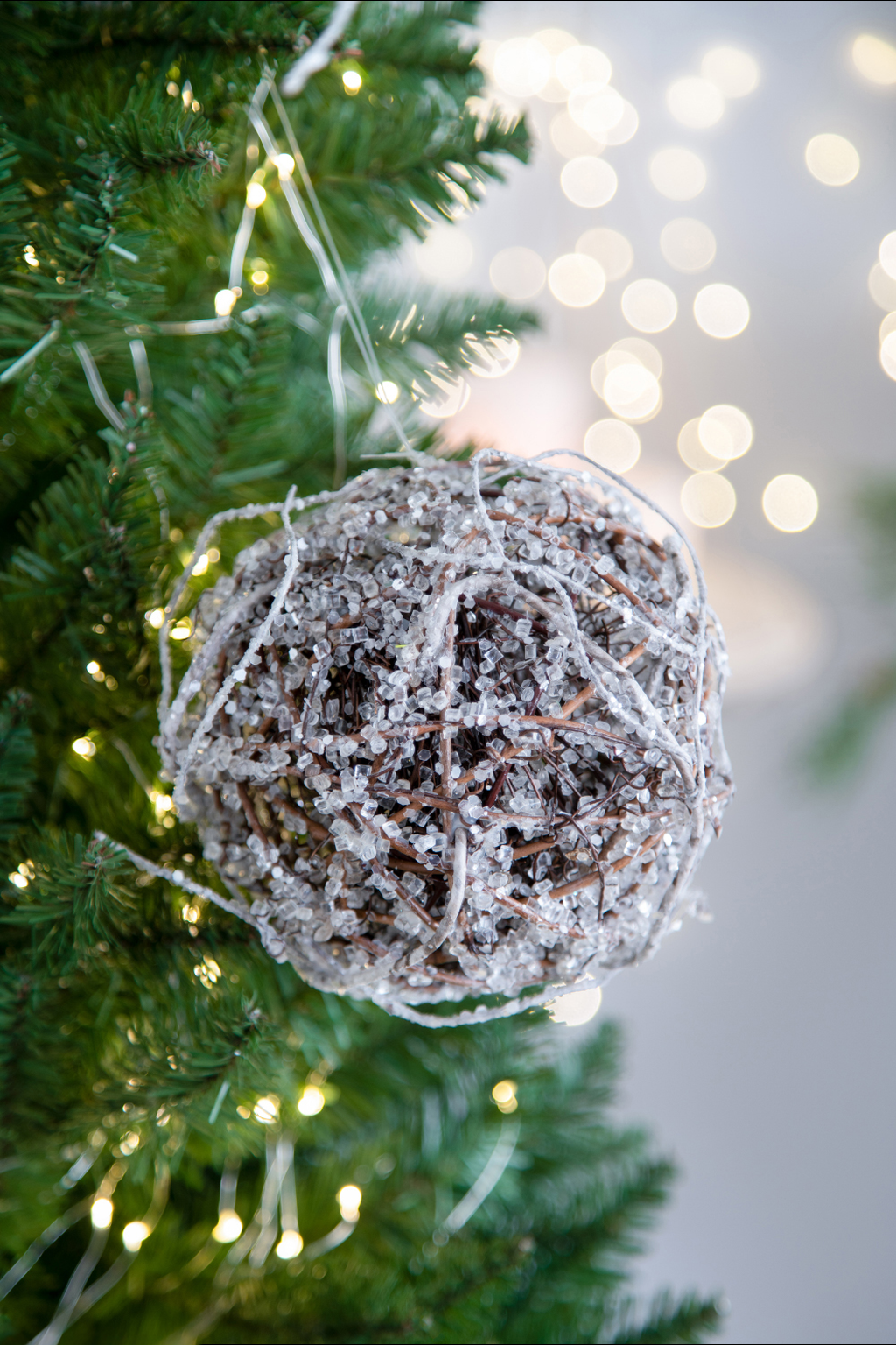 Rustic natural twig Christmas ornament with shimmering crystal accents