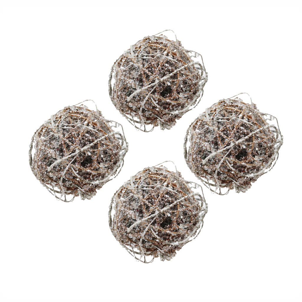 Four rustic grapevine balls with glitter accents perfect for holiday decor