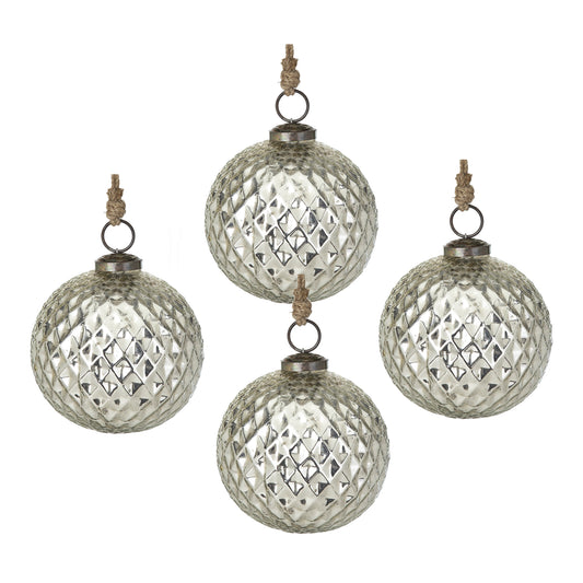 Four mercury glass Christmas ornaments with diamond pattern texture