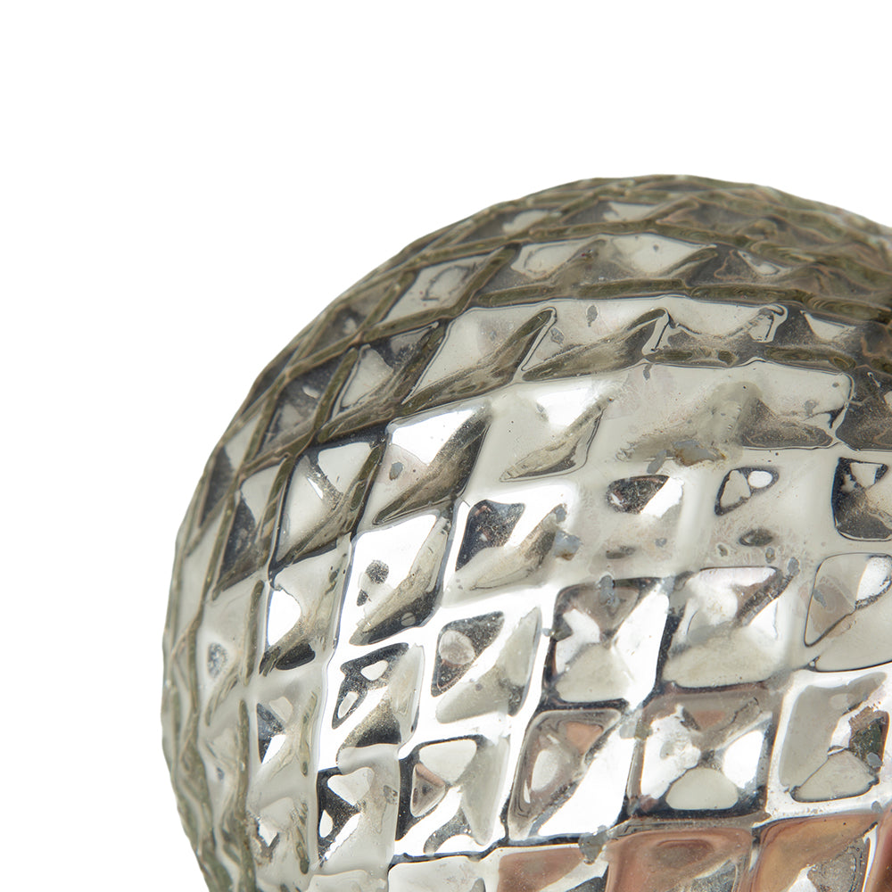 Textured silver decorative sphere with diamondshaped indents ideal as a Christmas ornament