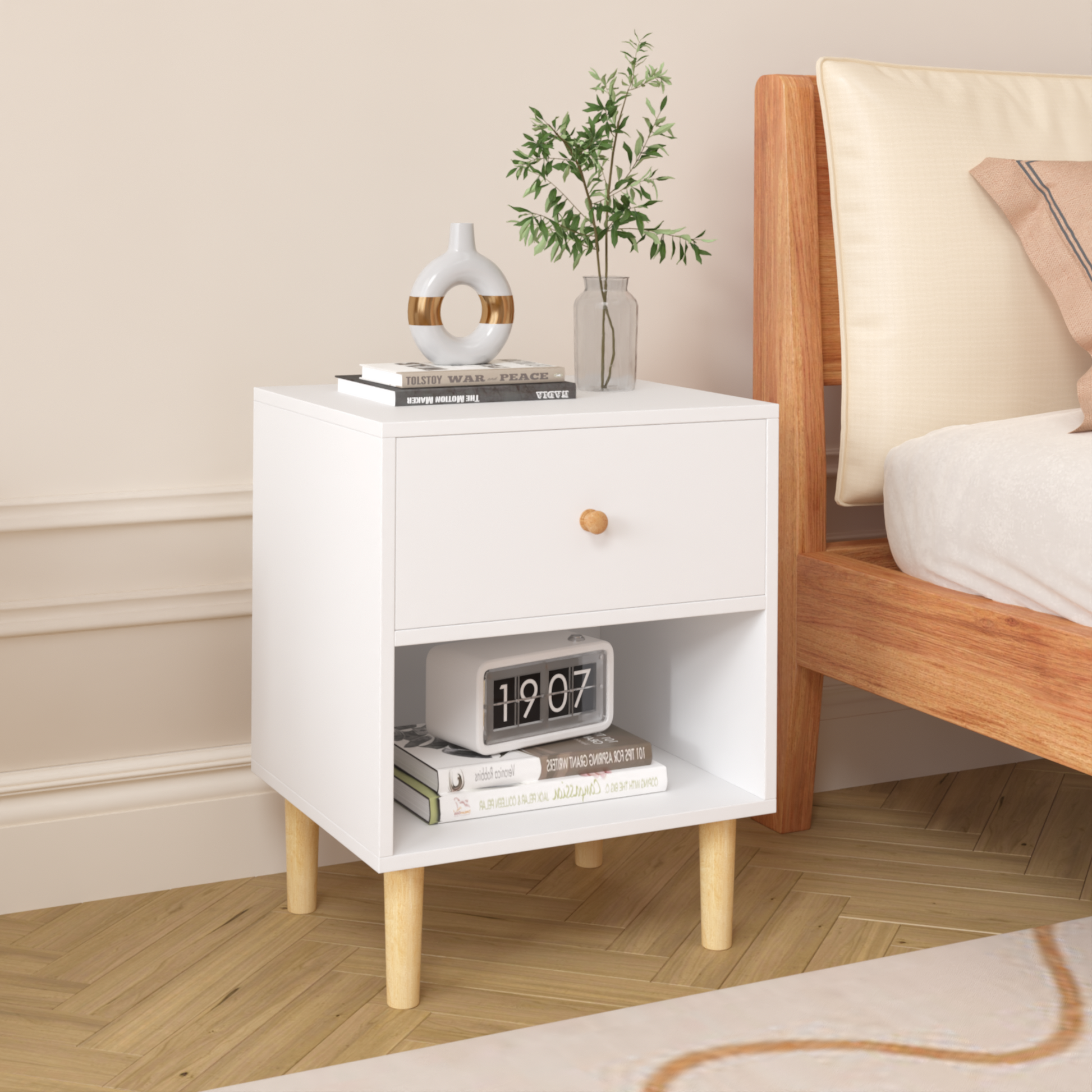 Modern white nightstand with a single drawer and open shelf featuring wooden legs