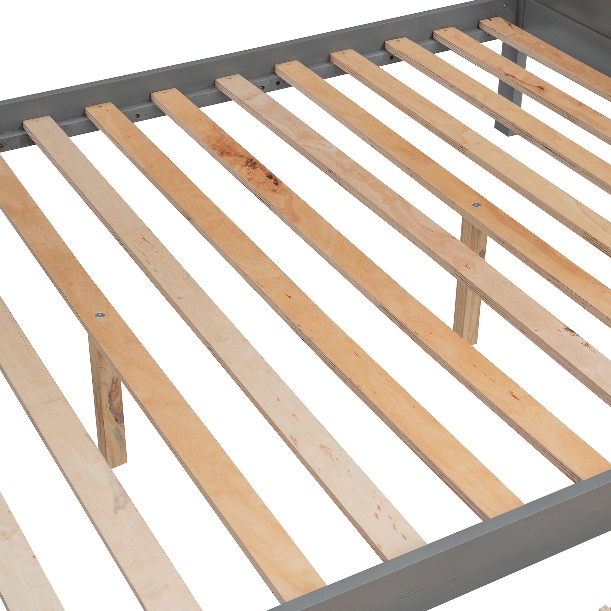 Closeup of grey wooden bed frame with natural wood slats