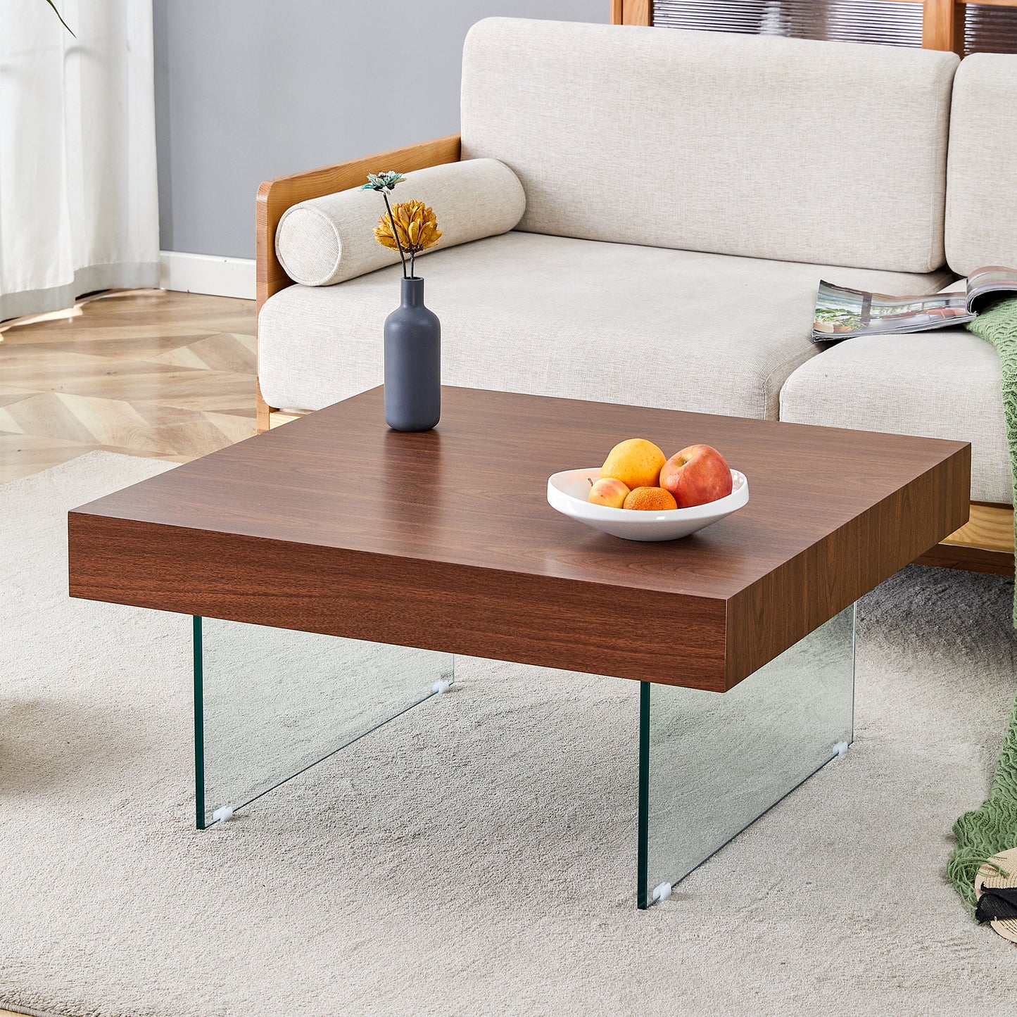 Modern square walnut coffee table with clear glass legs perfect for living rooms