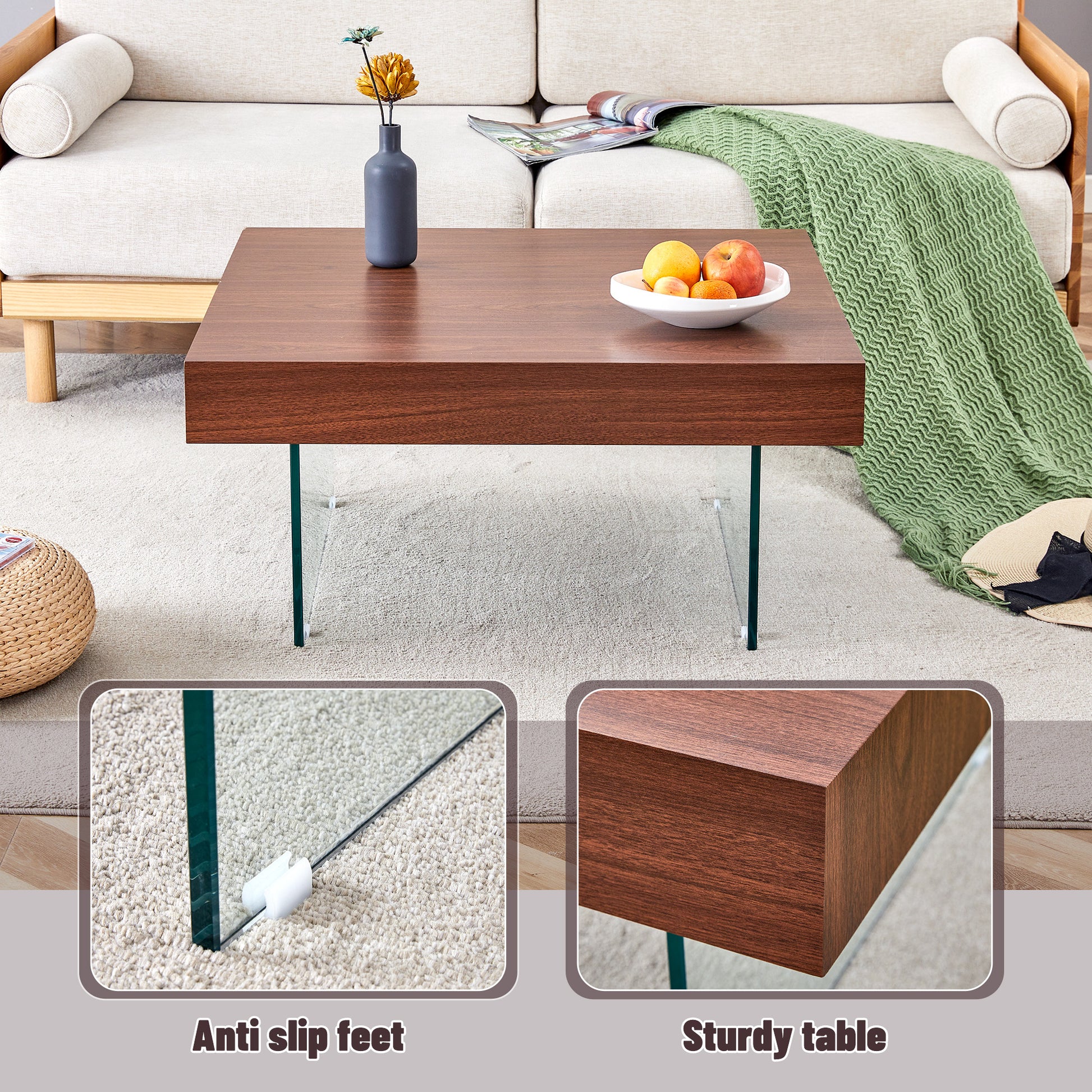 Dark walnut coffee table with modern glass legs and a white fruit bowl