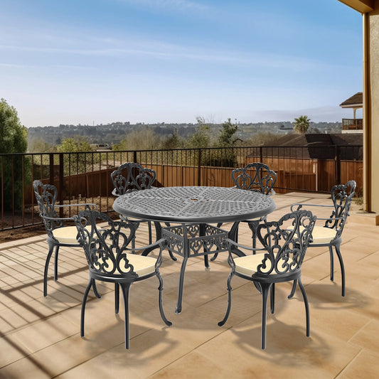 Black ornate cast aluminum patio dining set with cream cushions