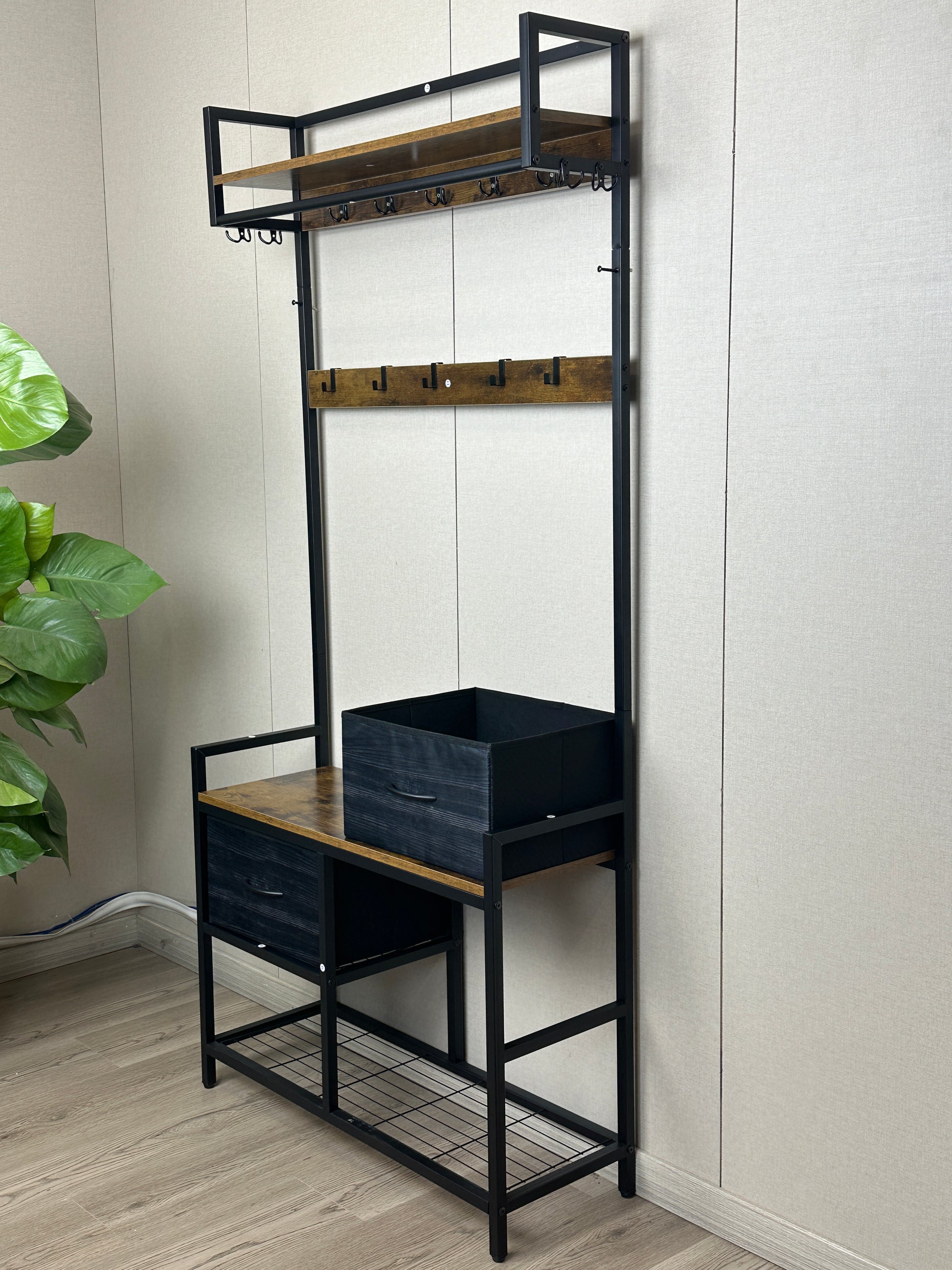 Industrial hall tree with black metal frame and wood shelves  coat hooks