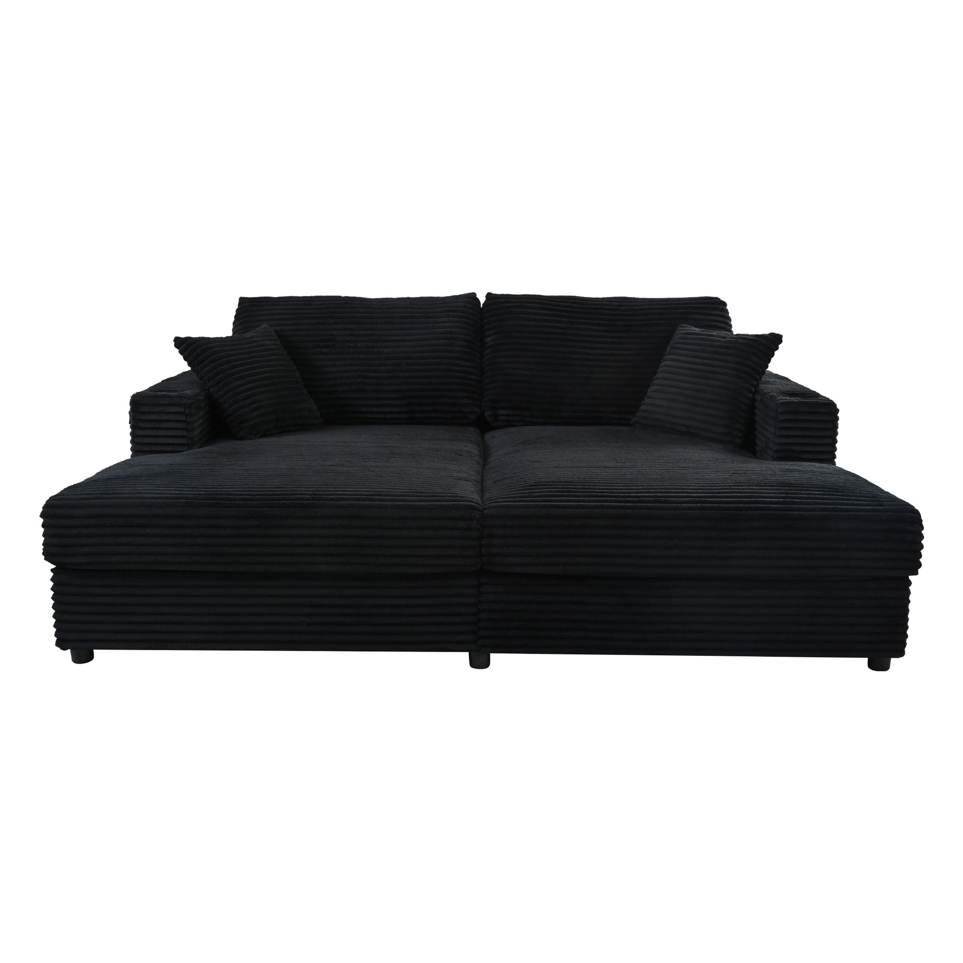Black corduroy sectional sofa with two throw pillows