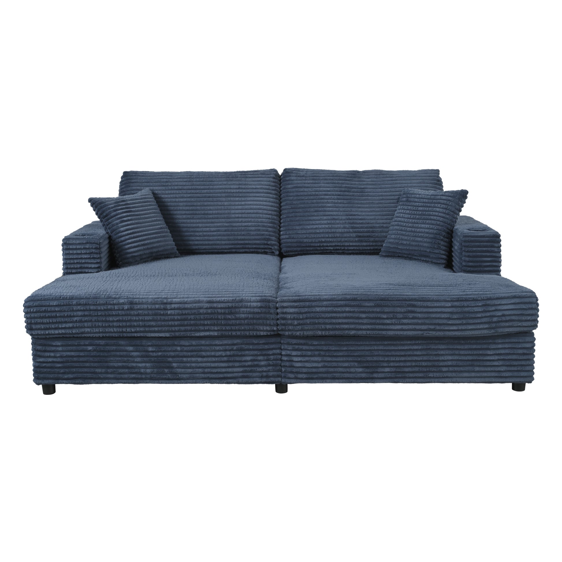 Deep blue corduroy sectional sofa with tufted cushions and matching throw pillows