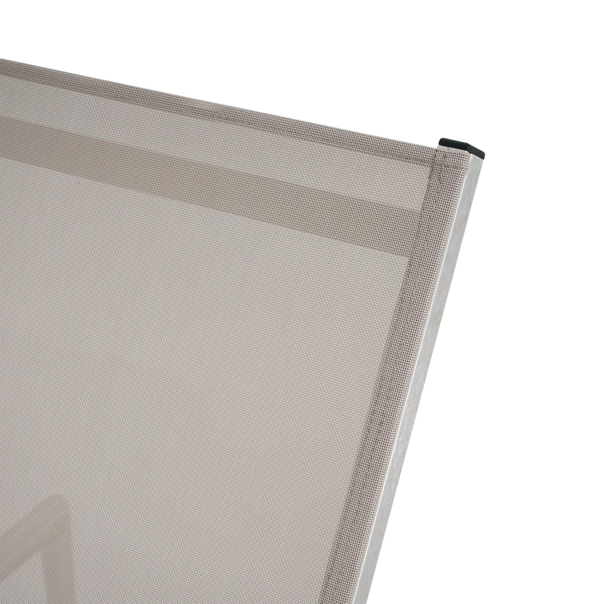 Closeup of a beige outdoor chair mesh fabric with silver aluminum frame and black corner cap
